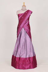 Lavender tissue lehenga featuring intricate thread weaving details with a beautiful contrast border Paired with a brocadeshawl