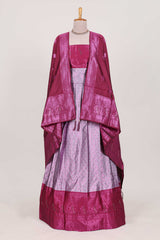 Lavender tissue lehenga featuring intricate thread weaving details with a beautiful contrast border Paired with a brocadeshawl