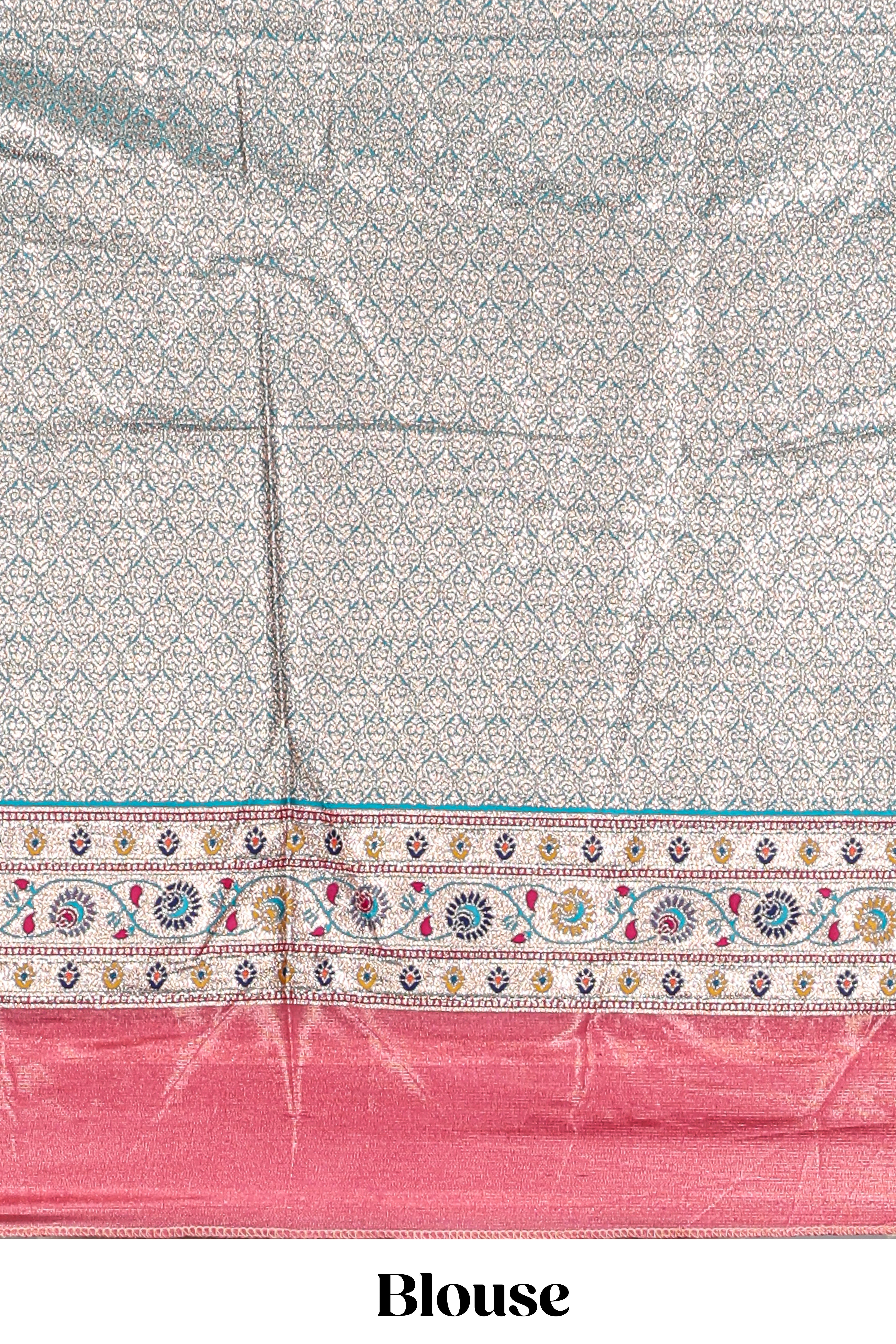 Peach butta designed lehanga with contrast floral design border and contrast blouse paired with matching floral butta motifs shawl