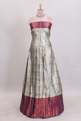 Antique ivory unique designed lehanga featuring contrasting border and matching blouse paired with contrast navy blue shawl
