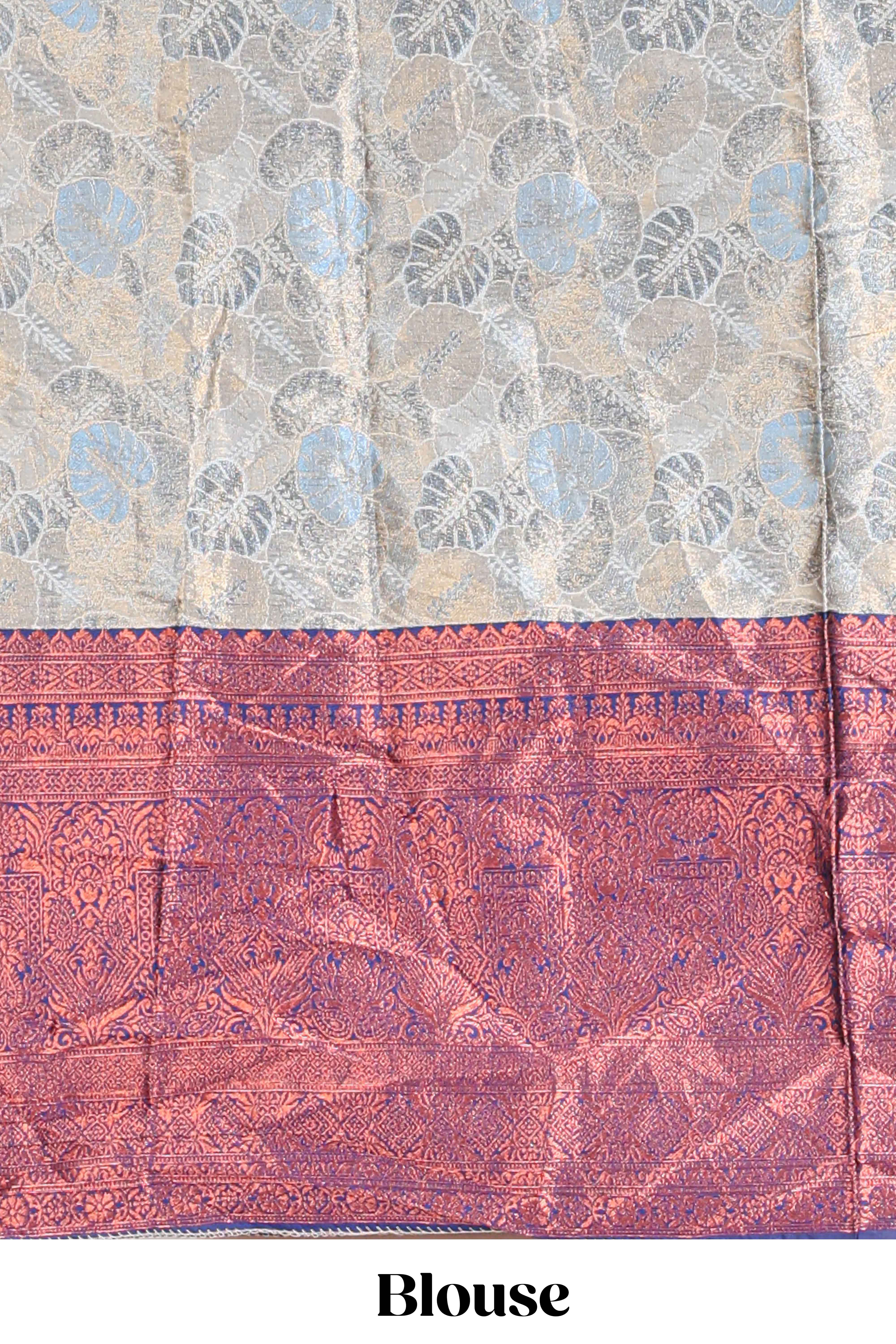 Antique ivory unique designed lehanga featuring contrasting border and matching blouse paired with contrast navy blue shawl