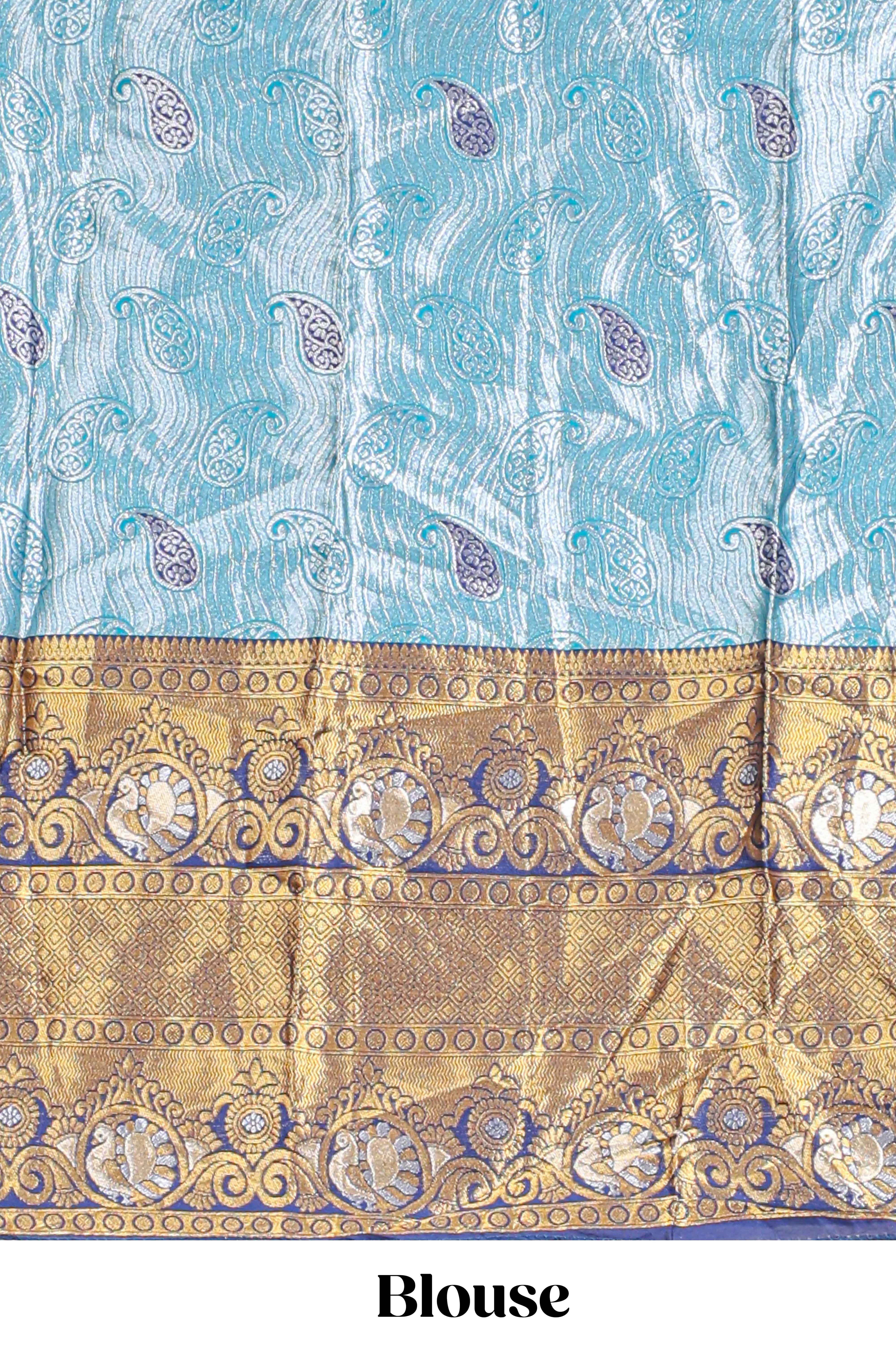 Light blue shade manga motifs lehanga featuring contrasting zari border and matching blouse paired withnavy blue organza shawl
