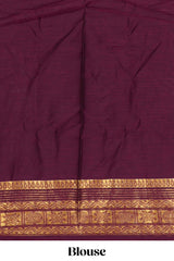 Lavender shade plain lehanga featuring contrasting zari border and blouse paired withmaroonshawl