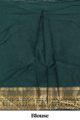 Green shade plain lehanga featuring contrasting zari border and blouse paired with pine green shawl