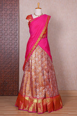 Orange jacquard floral zari design half saree with contrast zari border and dhavani