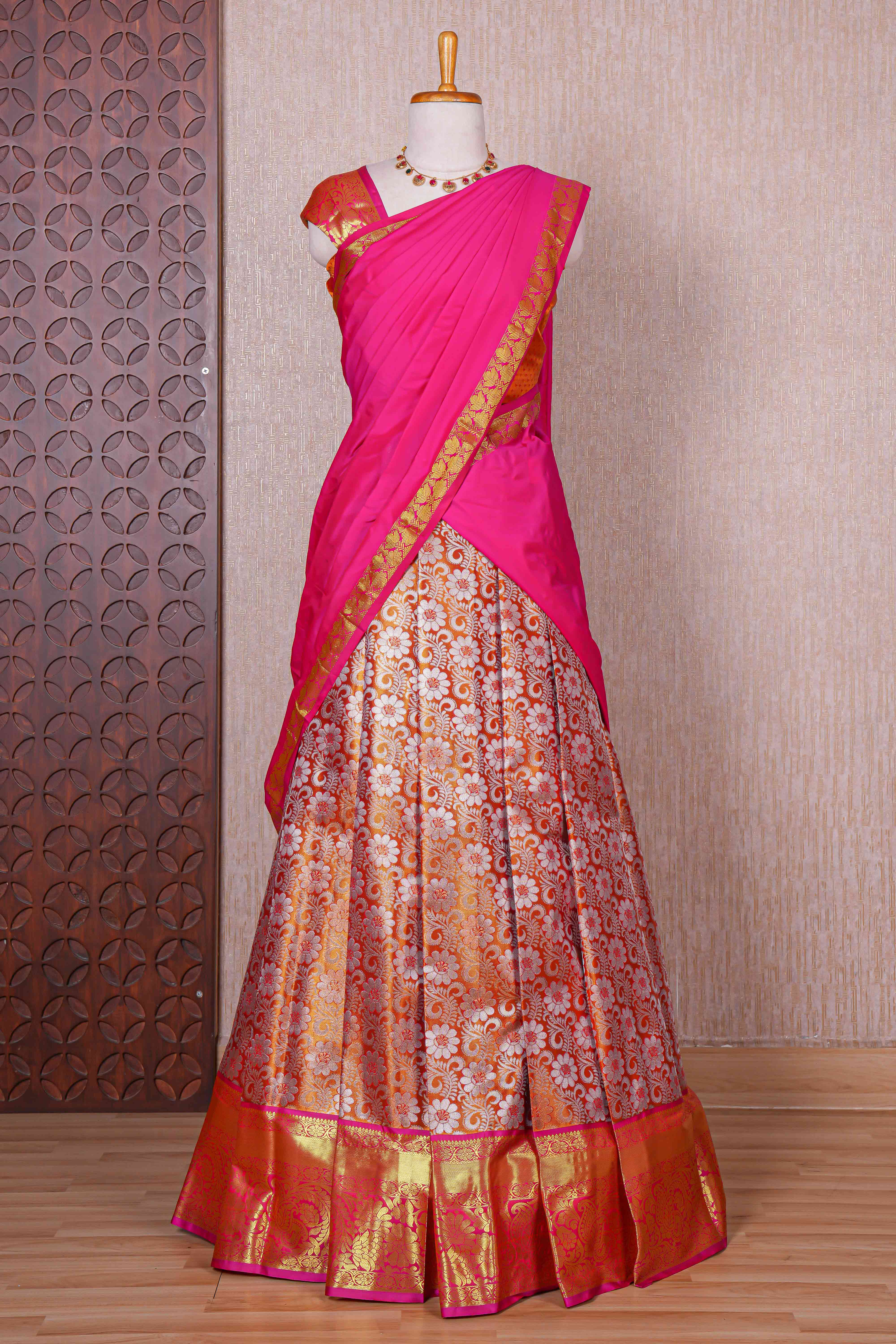 Orange jacquard floral zari design half saree with contrast zari border and dhavani
