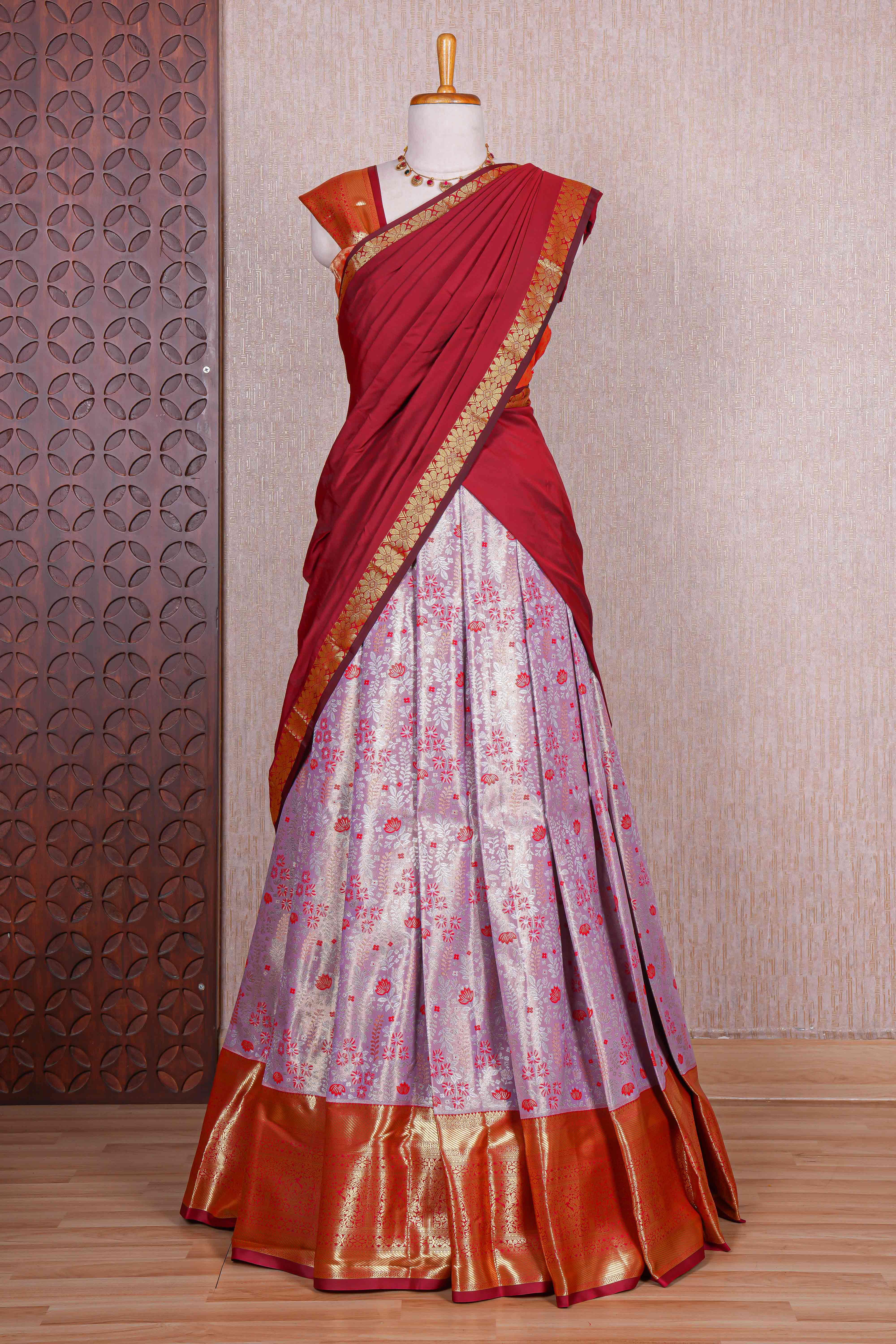 Pastel lavender jacquard floral zari design half saree with contrast zari border and dhavani