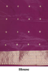 Cream zari checked art litchi silk saree with contrast border and floral zari butta blouse