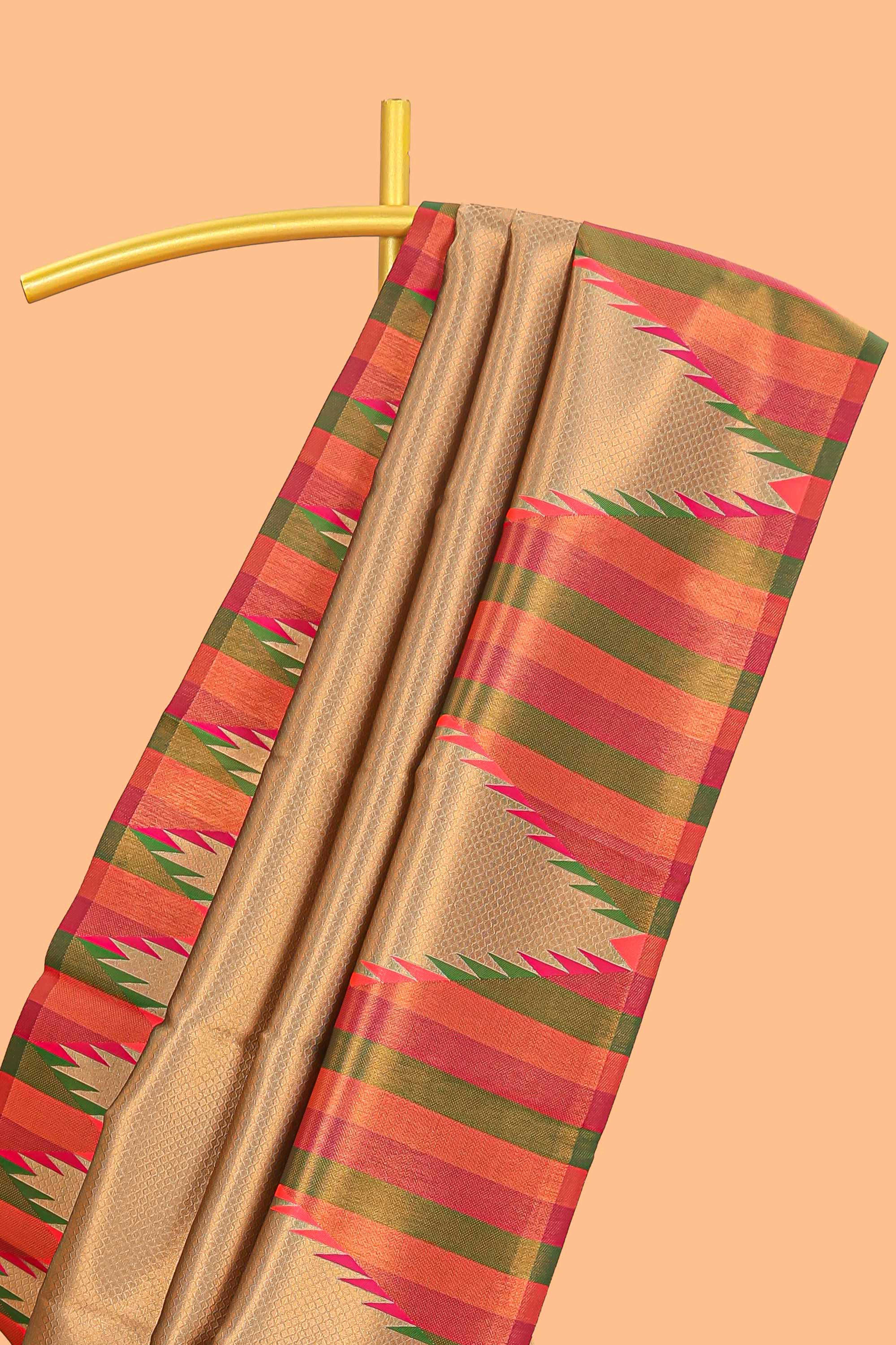 Golden plain litchi silk saree with contrast multi color ikkat style border and blouse