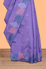 Borderless lavender floral motifs litchi silk saree with multi color bottom leaf designs and contrast blouse
