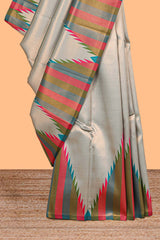 Green plain litchi silk saree with contrast multi color ikkat style border and blouse