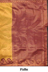 Yellow chevron zari design litchi silk saree with contrast swirl shape zari border and blouse