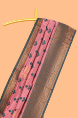 Pink floral design zari motifs litchi silk saree with contrast zari border and blouse