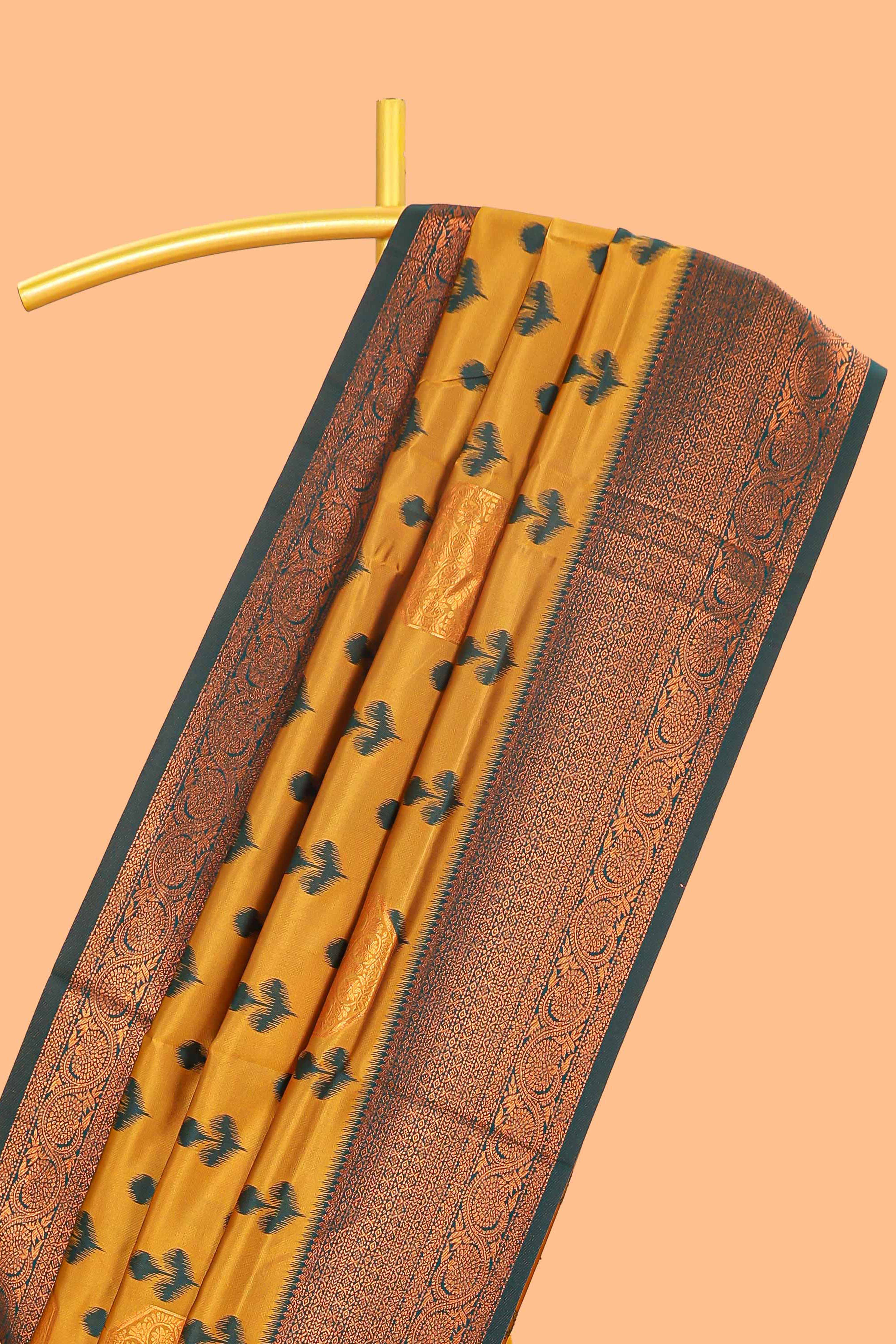 Mustard floral design zari motifs litchi silk saree with contrast zari border and blouse