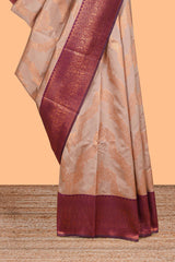 Beige chevron zari design litchi silk saree with contrast zari design border and contrast blouse
