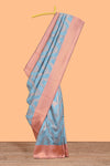 Sky blue chevron zari design litchi silk saree with contrast zari design border and contrast blouse