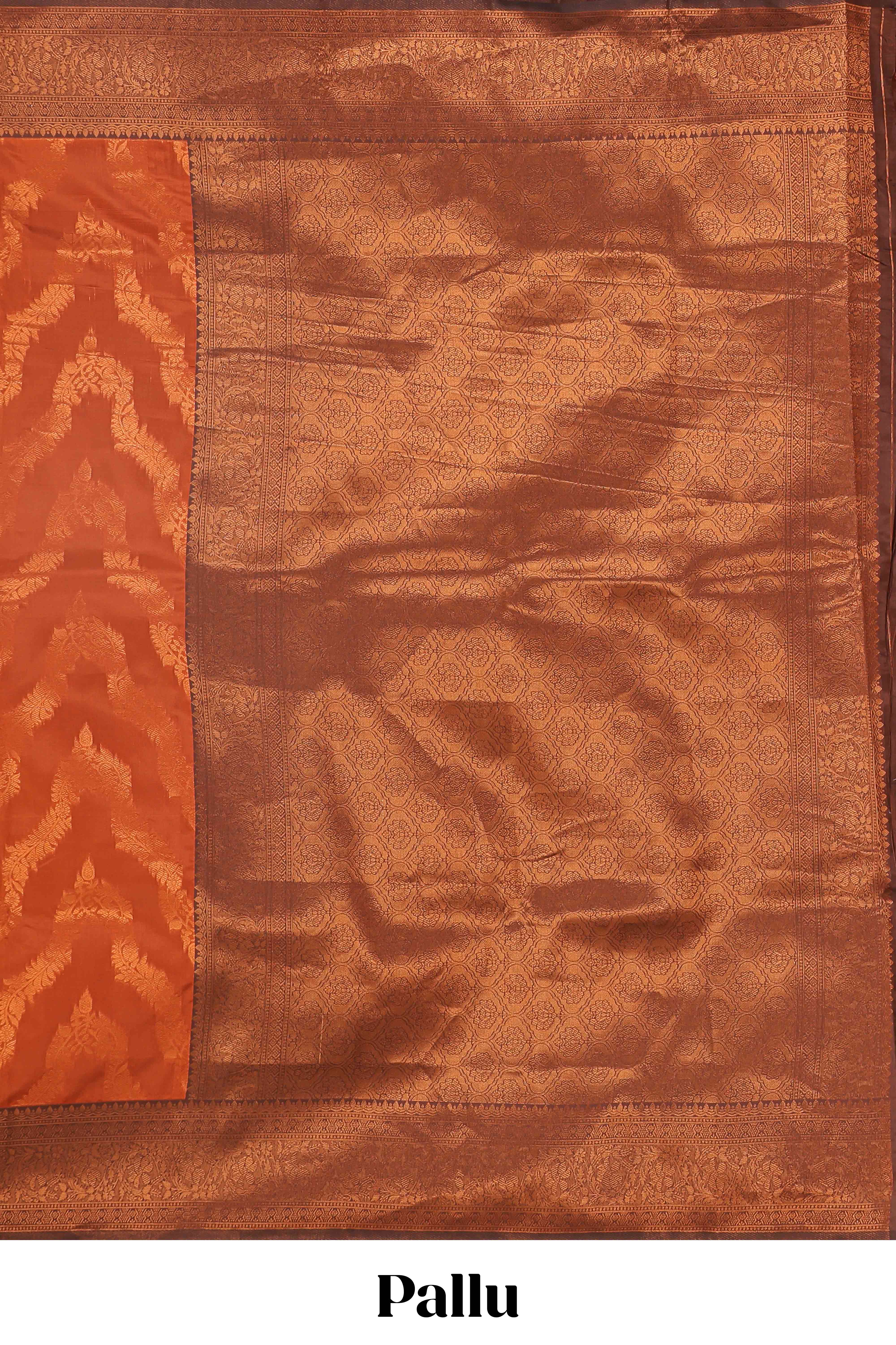 Orange chevron zari design litchi silk saree with contrast zari design border and contrast blouse