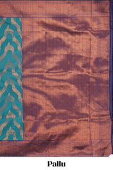 Jade green chevron zari design litchi silk saree with contrast zari design border and contrast blouse