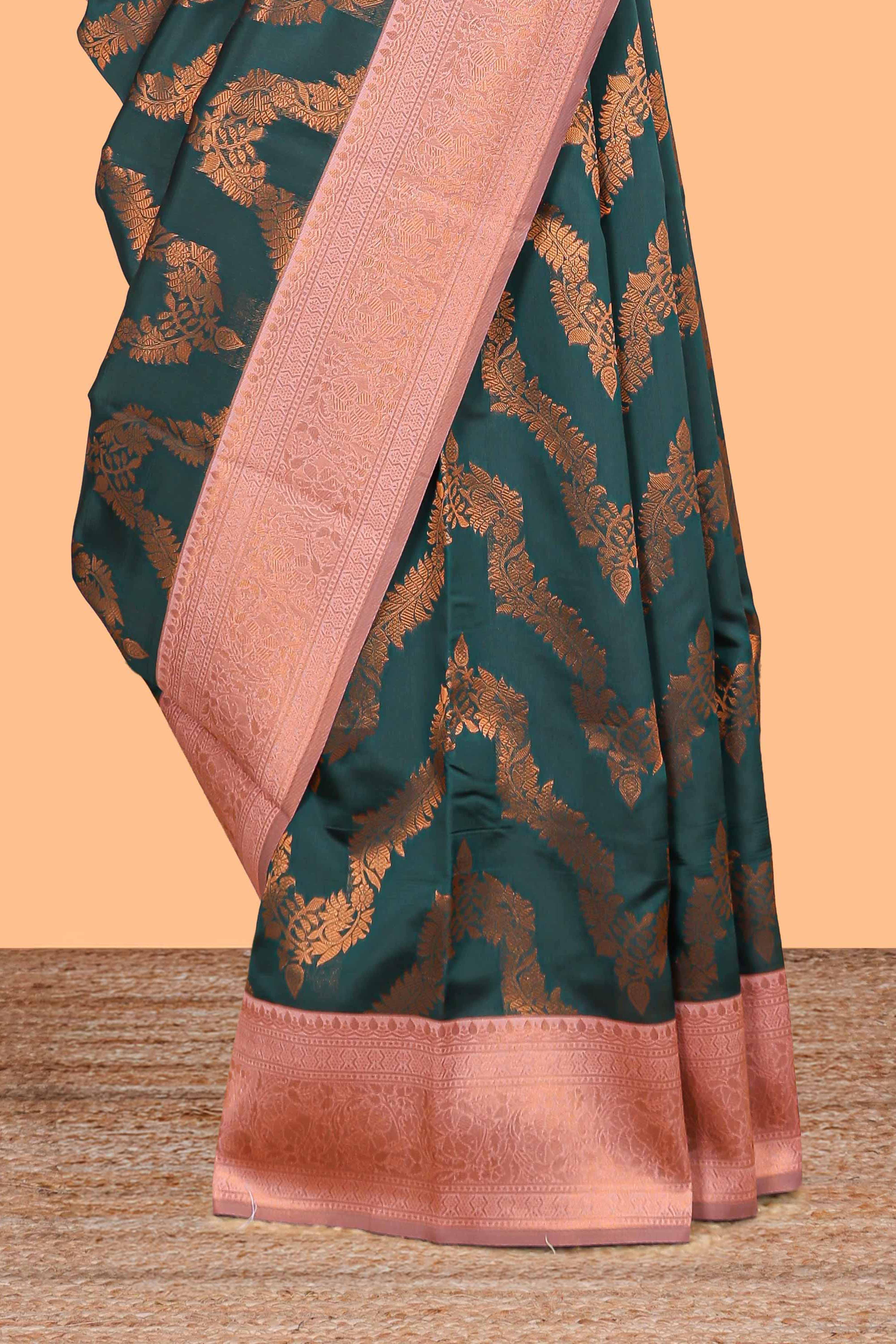 Green chevron zari design litchi silk saree with contrast zari design border and contrast blouse
