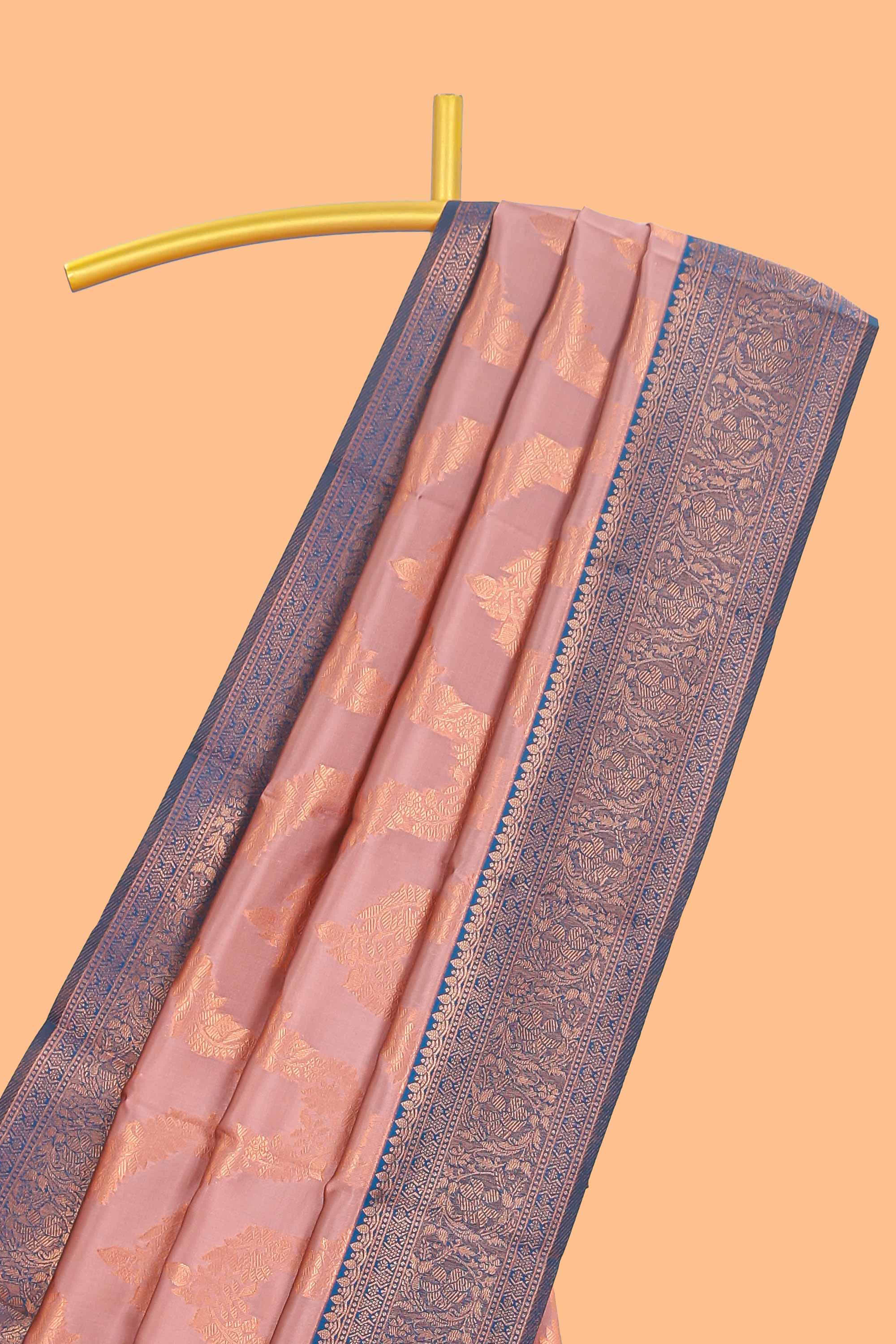 Pink chevron zari design litchi silk saree with contrast zari design border and contrast blouse