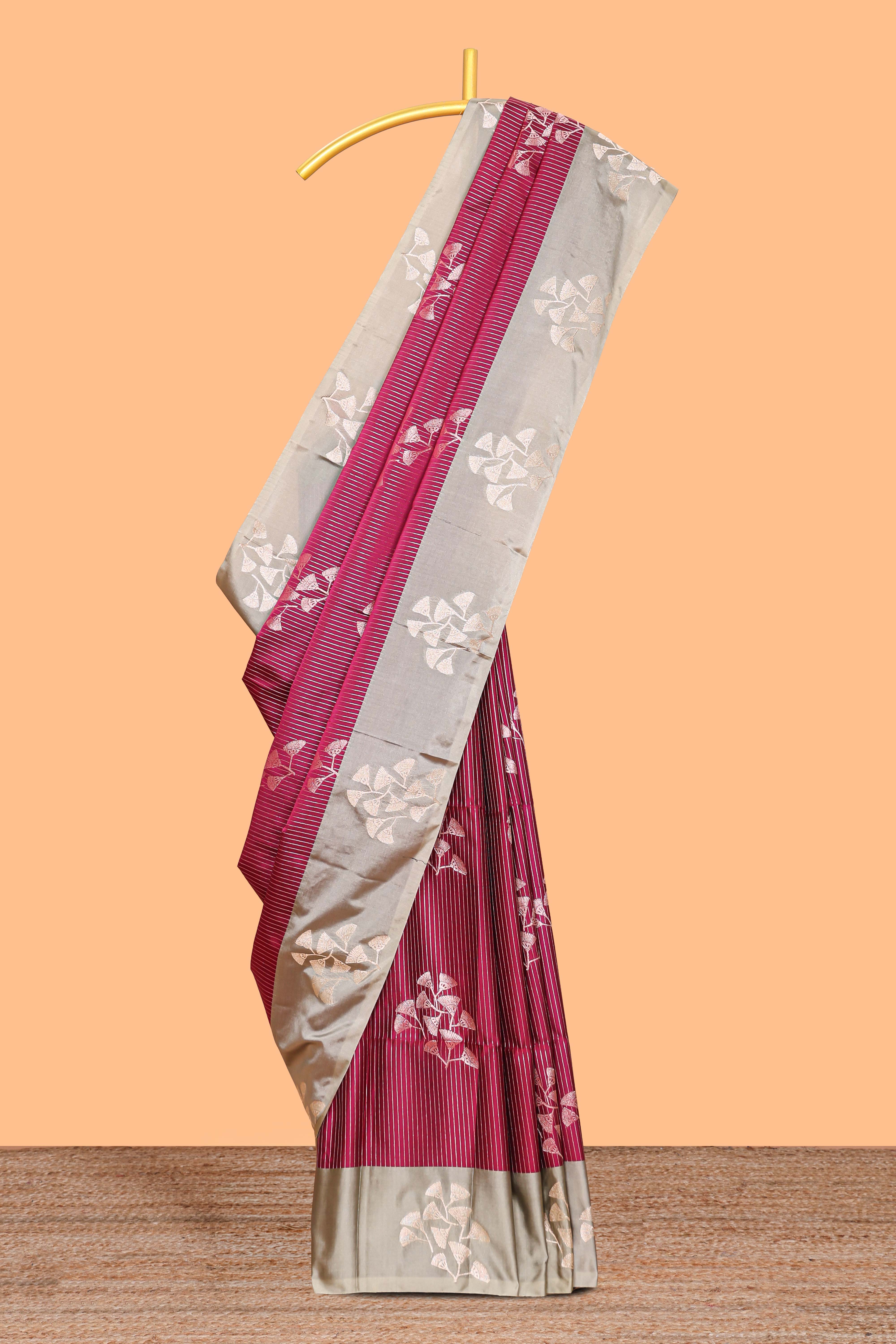 Maroon striped floral zari design litchi silk saree with contrast zari design border and plain blouse