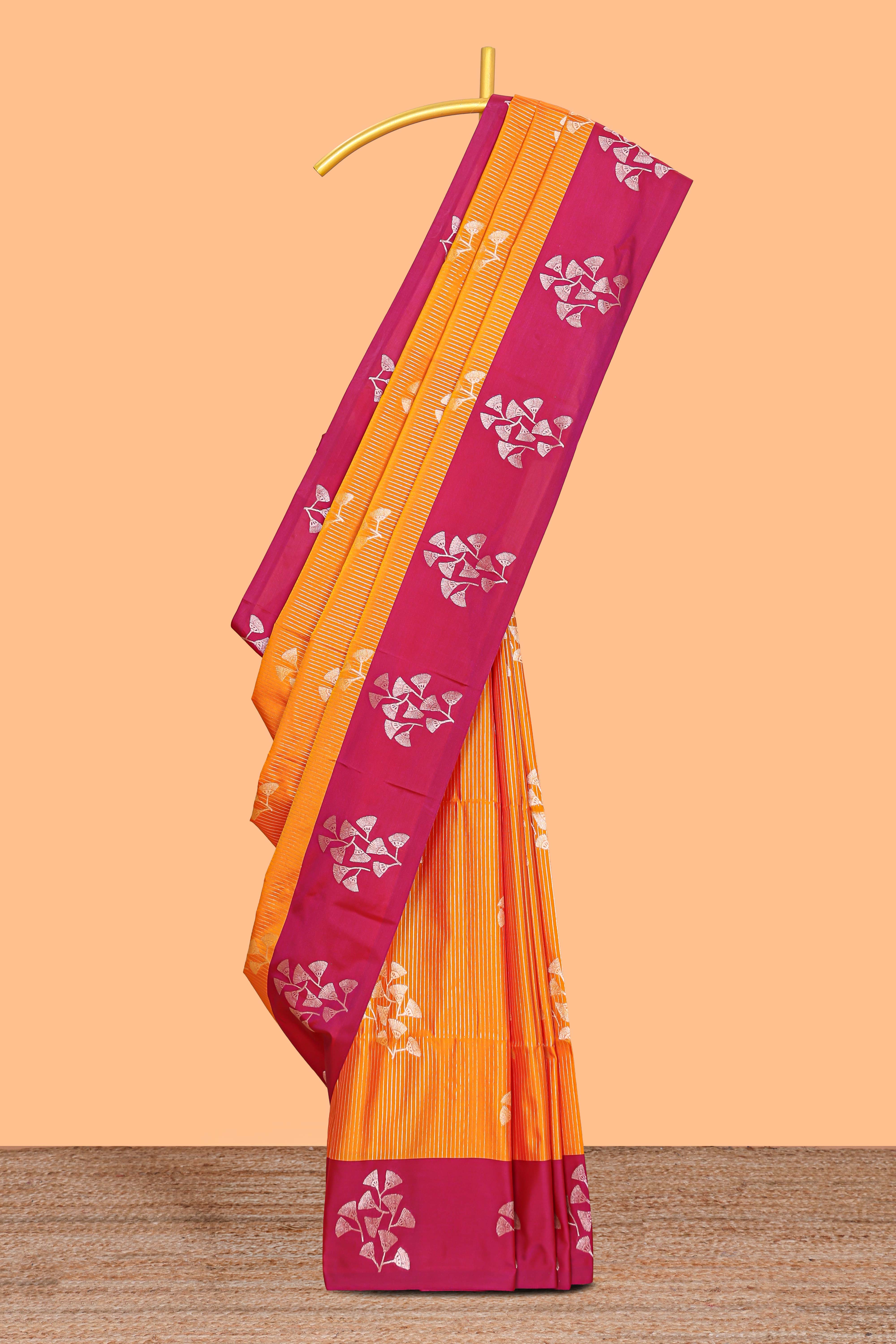 Mustard striped floral zari design litchi silk saree with contrast zari design border and plain blouse
