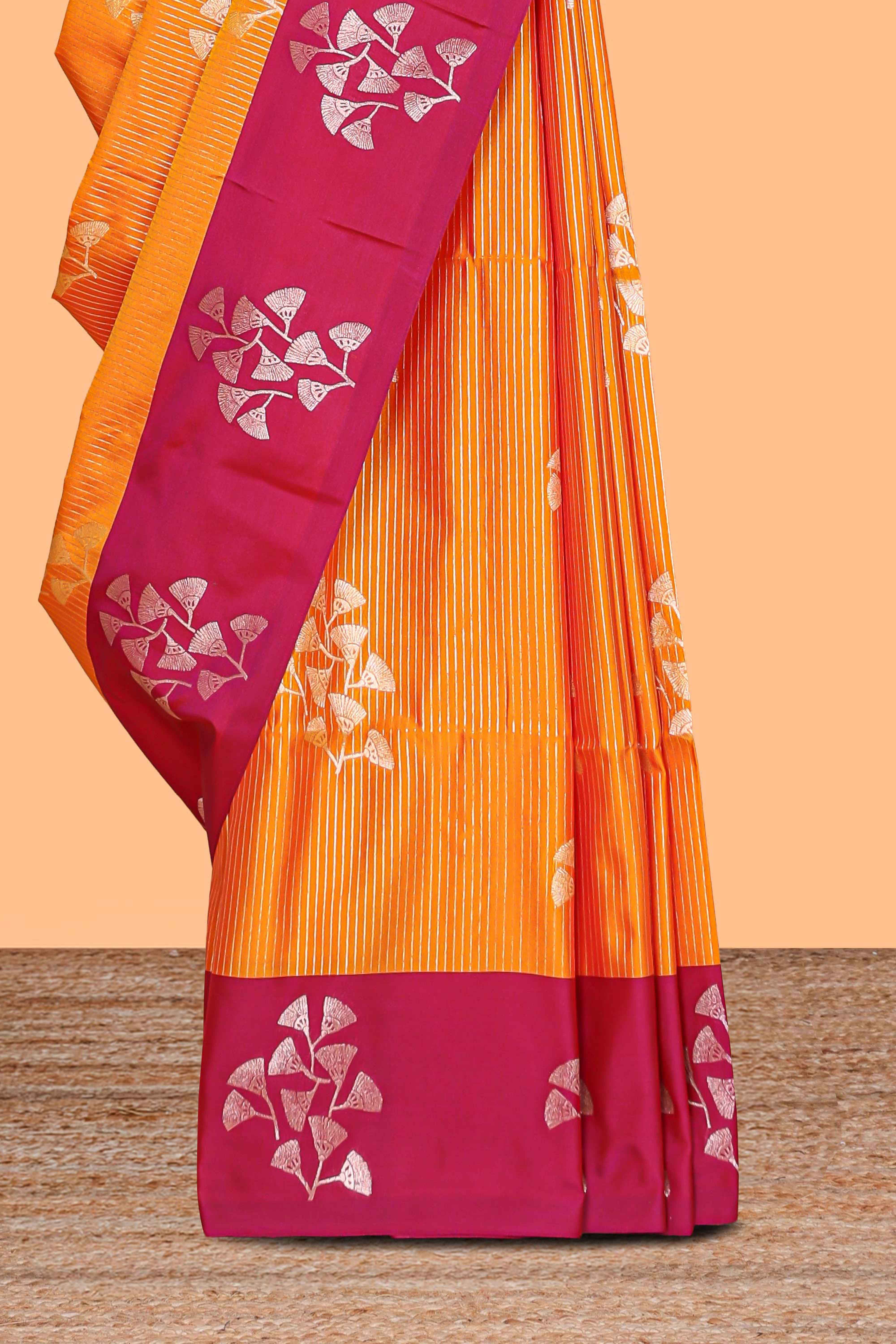 Mustard striped floral zari design litchi silk saree with contrast zari design border and plain blouse