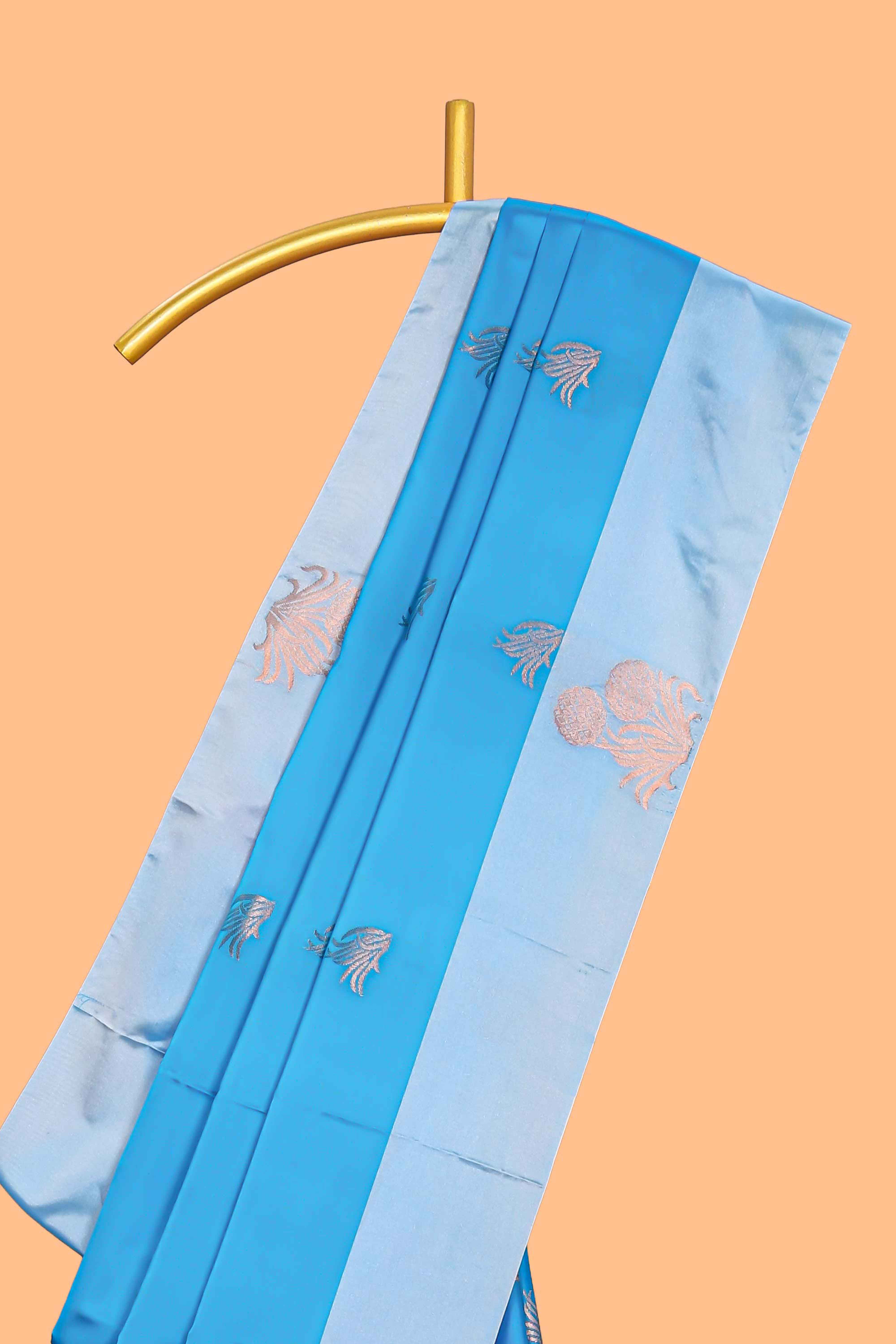 Blue zari motifs design litchi silk saree with contrast zari design border and plain blouse