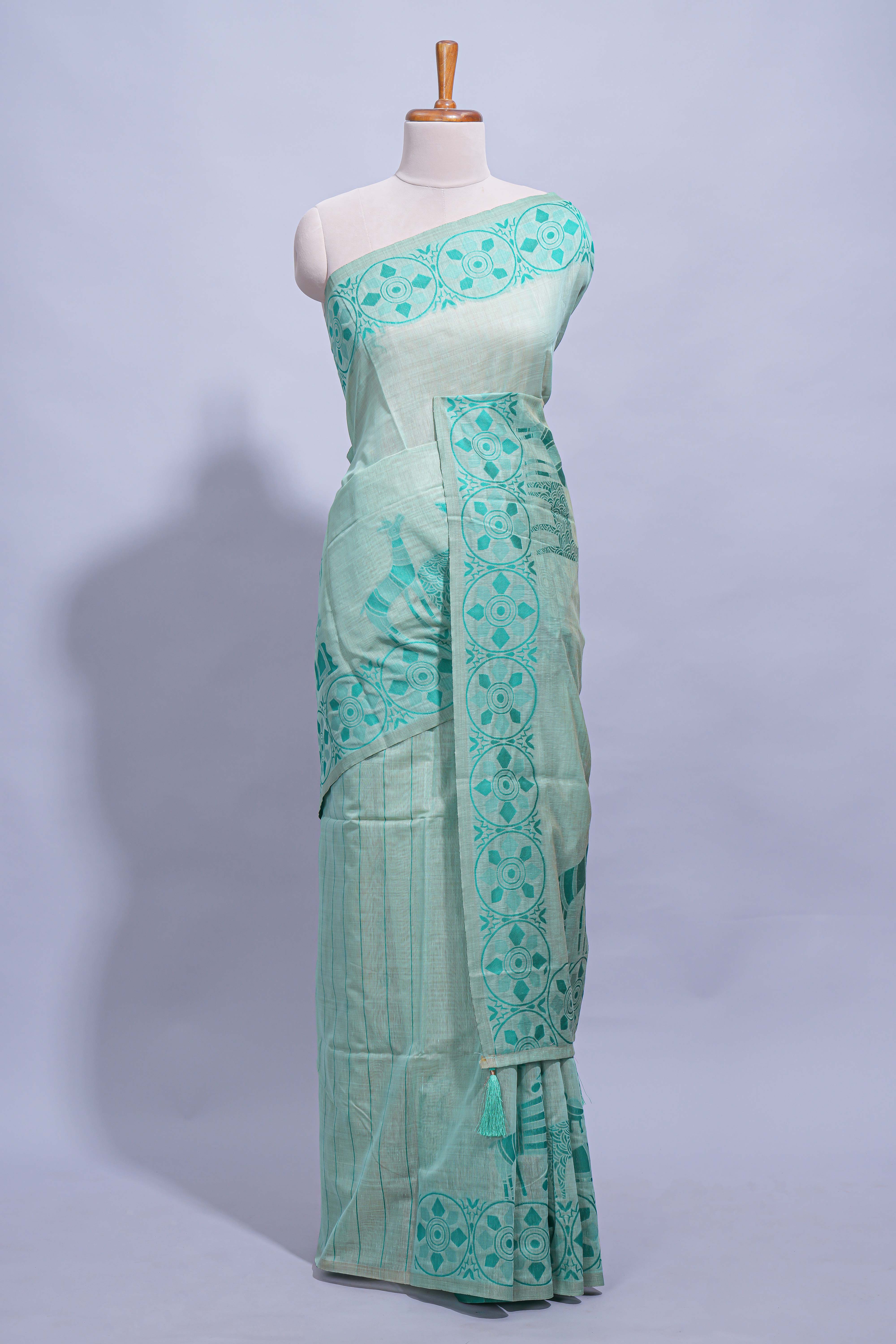 Cyan blue colour munga cotton vertical thread lines thread weaving border with floral jaal thread pichwai pallu and self small butta blouse