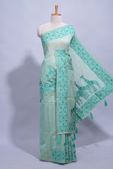 Cyan blue colour munga cotton vertical thread lines thread weaving border with floral jaal thread pichwai pallu and self small butta blouse
