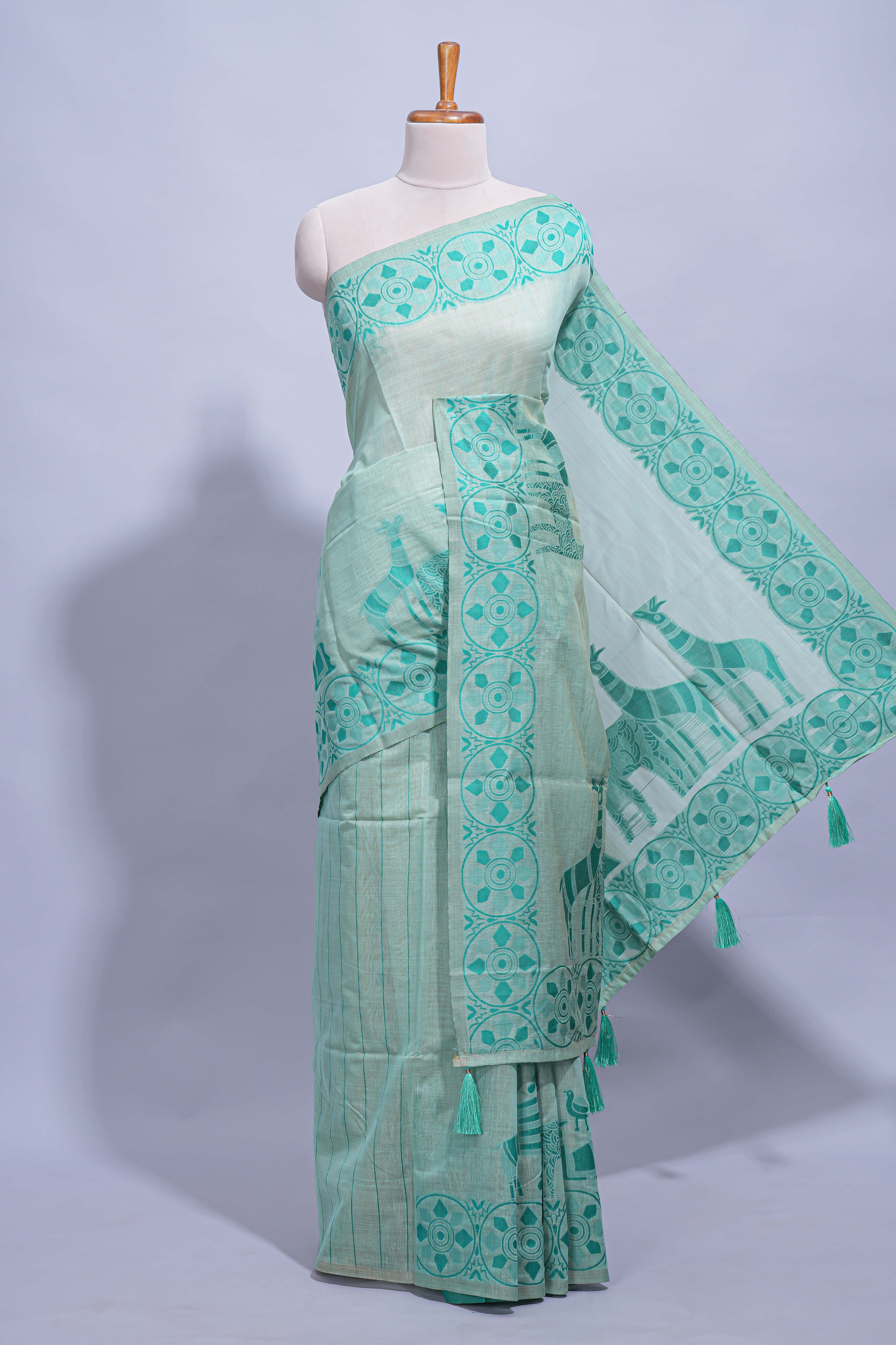 Cyan blue colour munga cotton vertical thread lines thread weaving border with floral jaal thread pichwai pallu and self small butta blouse