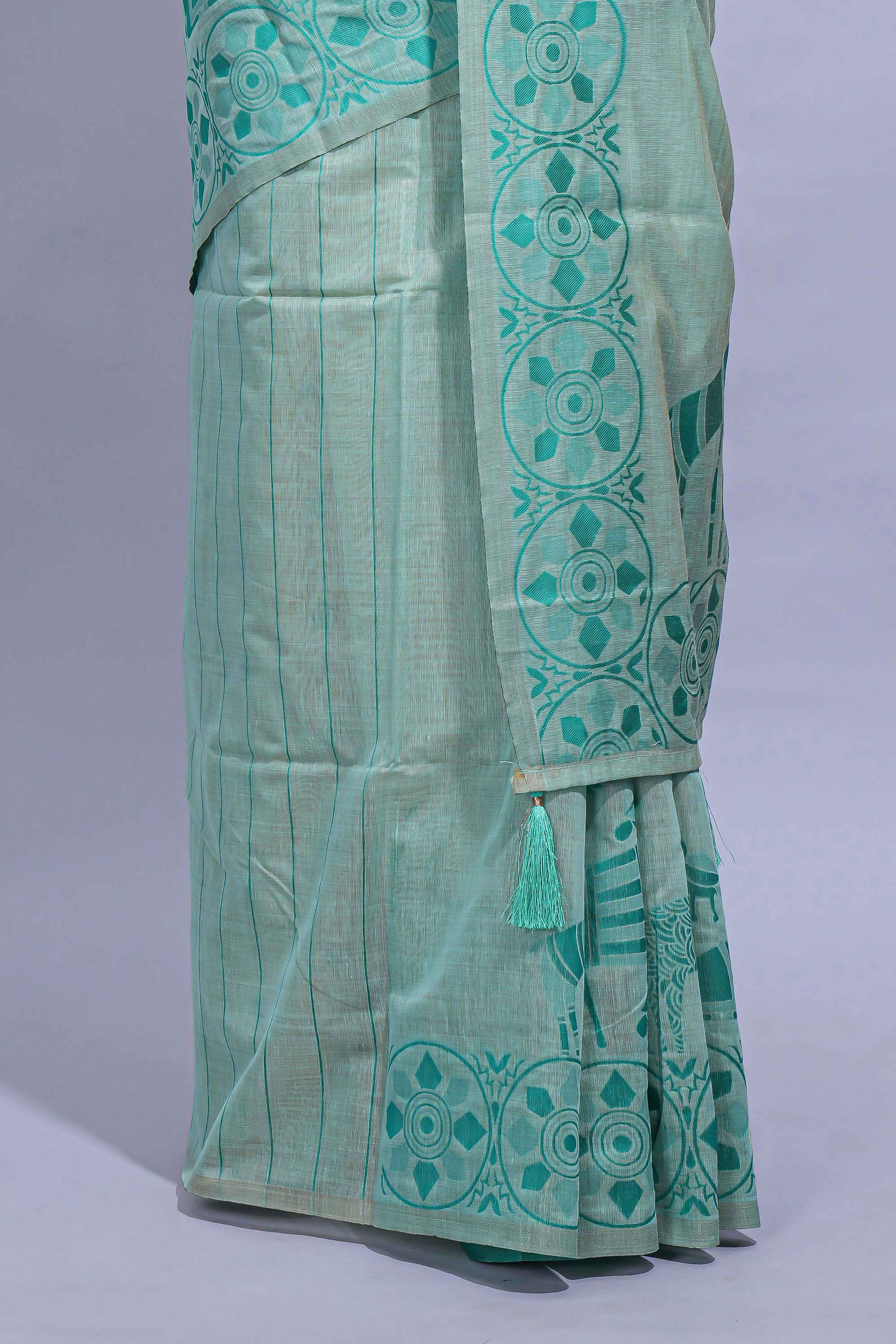 Cyan blue colour munga cotton vertical thread lines thread weaving border with floral jaal thread pichwai pallu and self small butta blouse