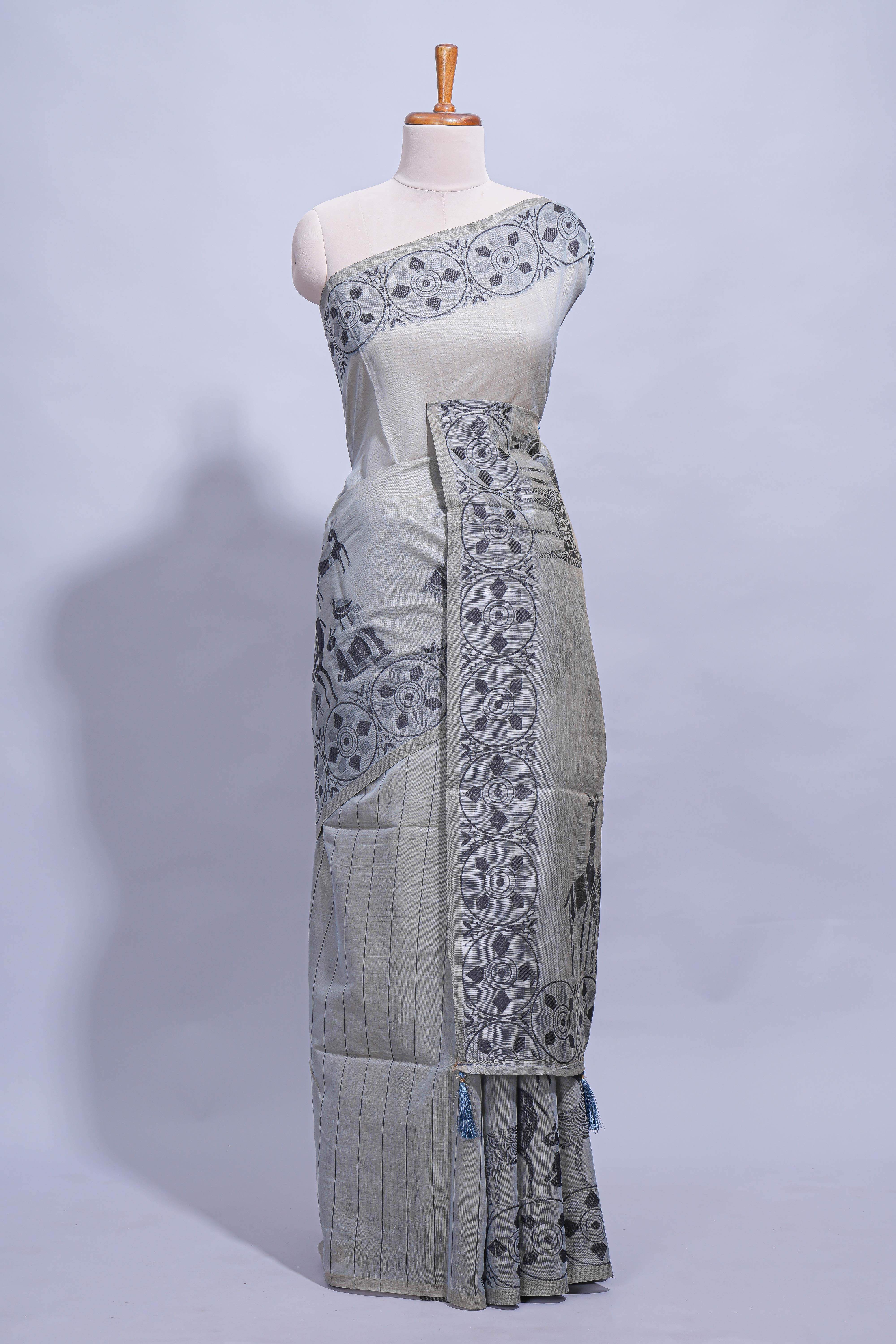 Grey colour munga cotton vertical thread lines thread weaving border with floral jaal thread pichwai pallu and self small butta blouse