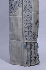 Grey colour munga cotton vertical thread lines thread weaving border with floral jaal thread pichwai pallu and self small butta blouse