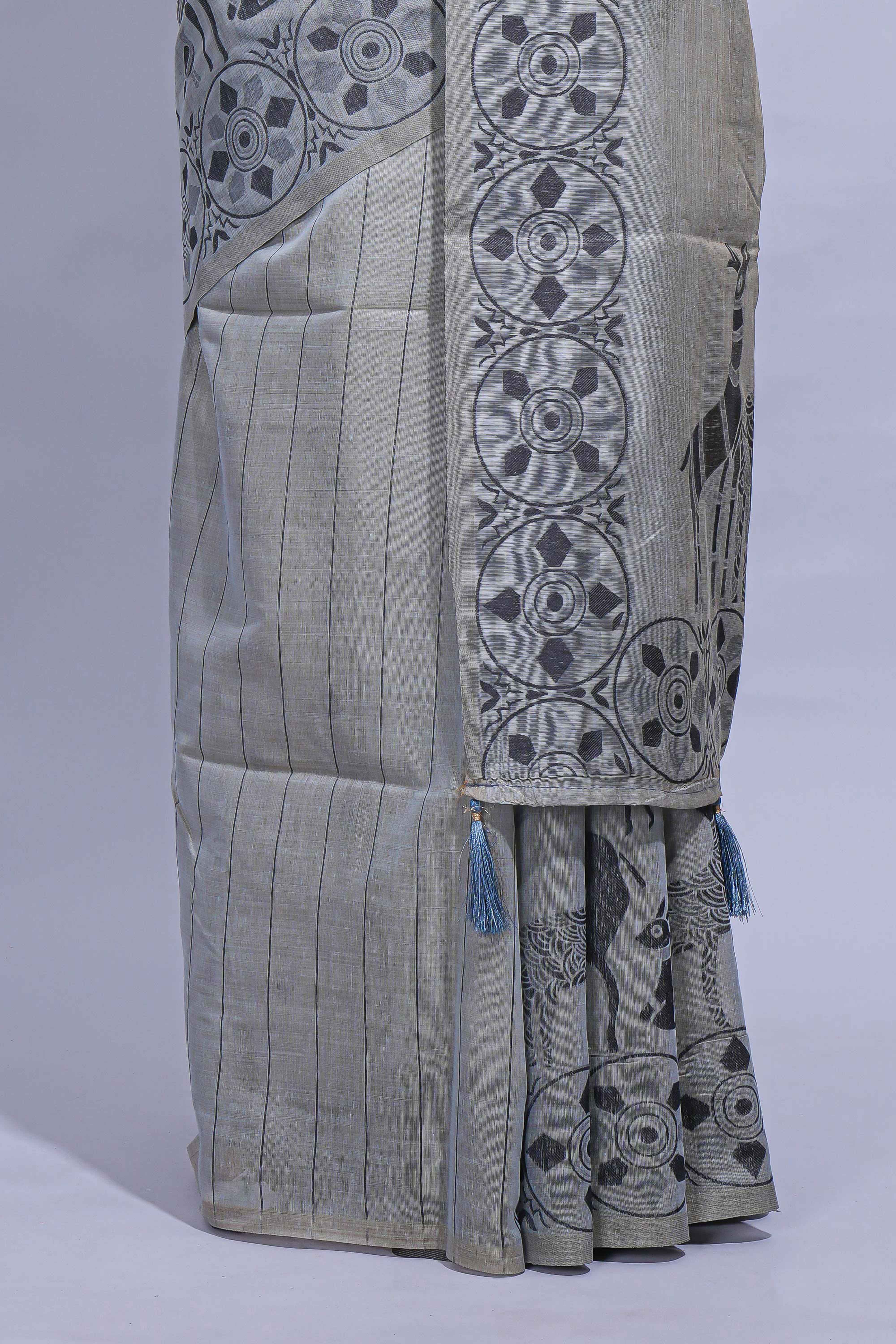 Grey colour munga cotton vertical thread lines thread weaving border with floral jaal thread pichwai pallu and self small butta blouse