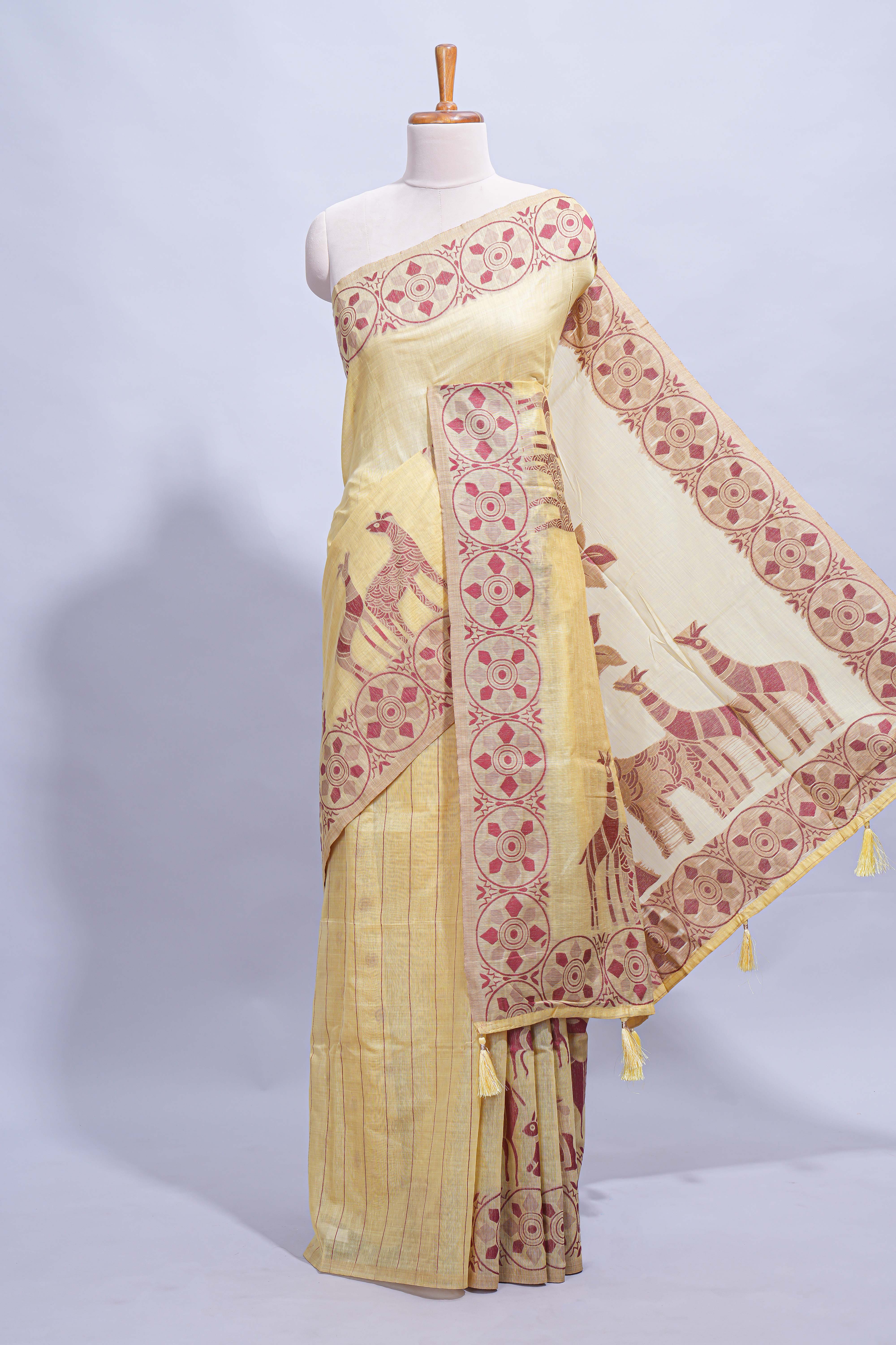 Powder Yellow colour munga cotton vertical thread lines thread weaving border with floral jaal thread pichwai pallu and self small butta blouse