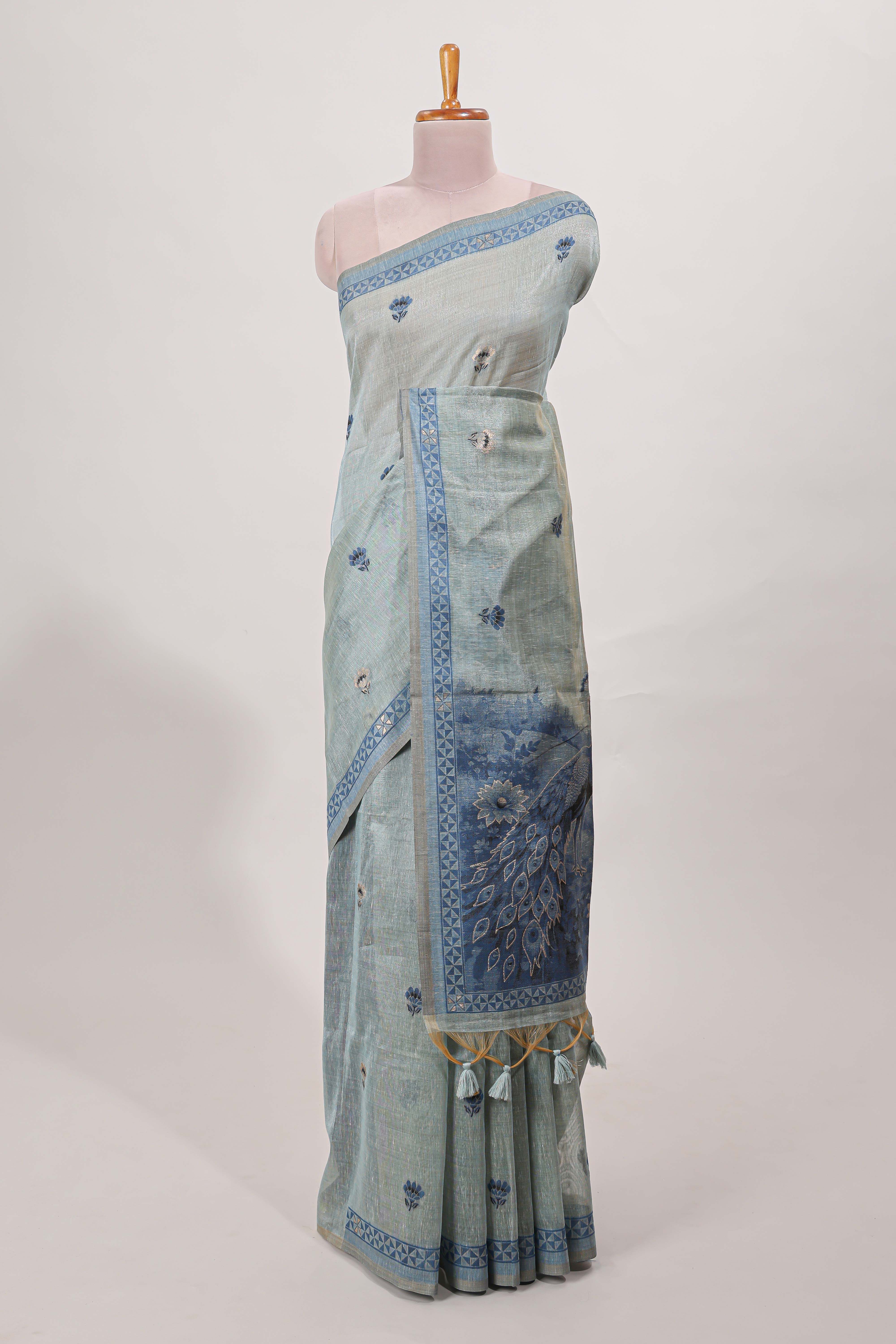 Blue munga cotton saree geometric border with peacock and floral motifs weaving and contrast blouse