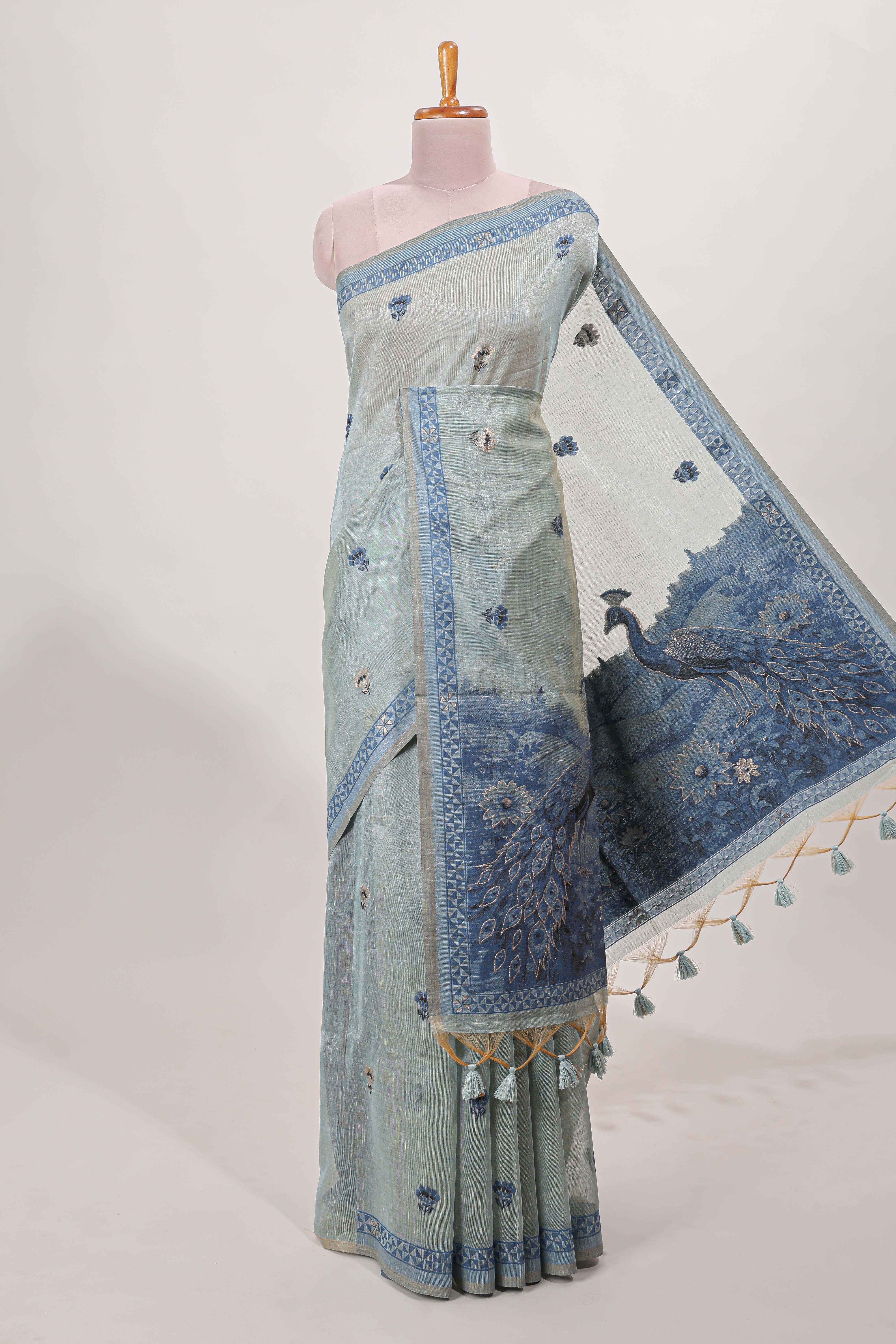 Blue munga cotton saree geometric border with peacock and floral motifs weaving and contrast blouse