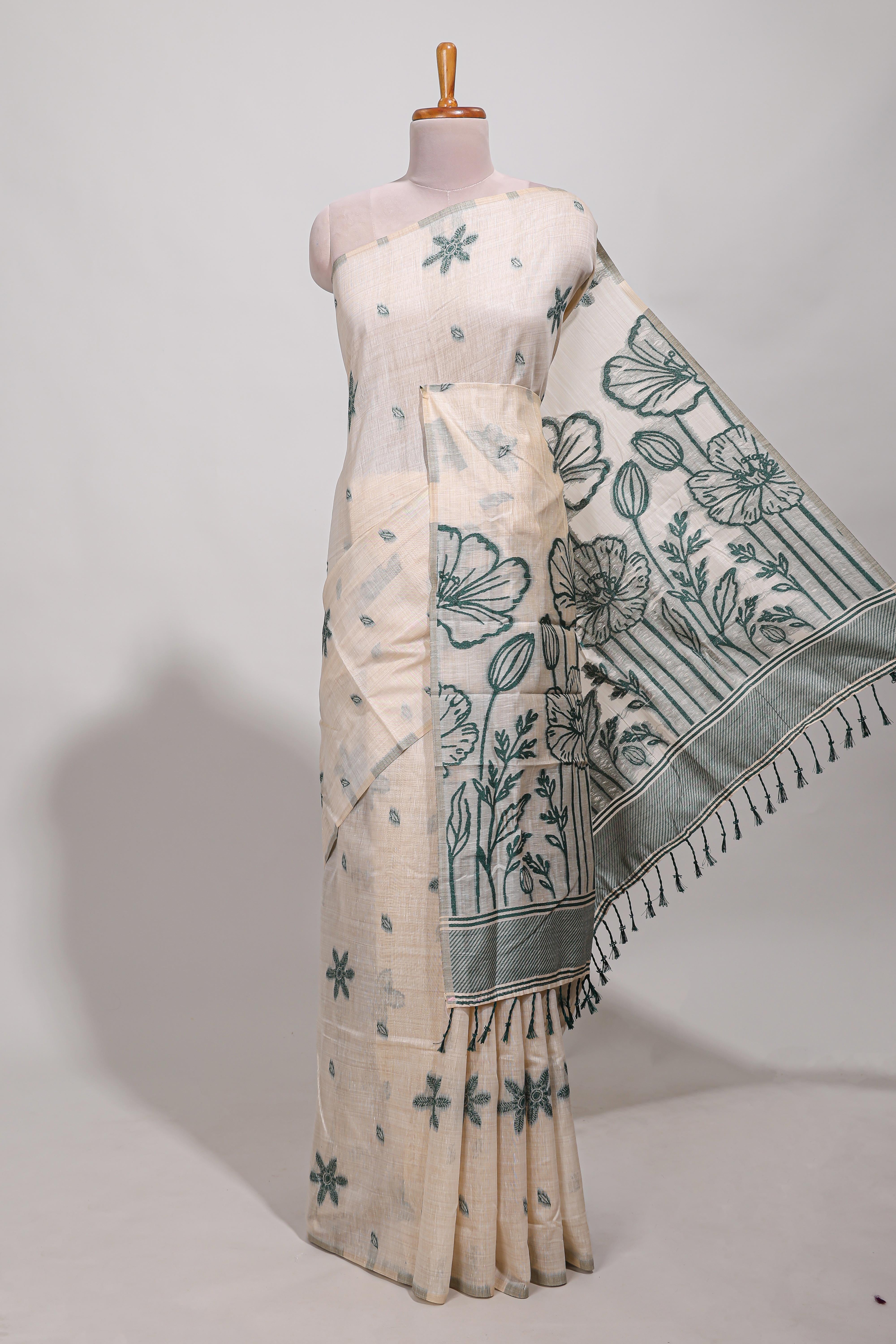 Green floral printmunga cotton sareewith matching floral print pallu along with tassles