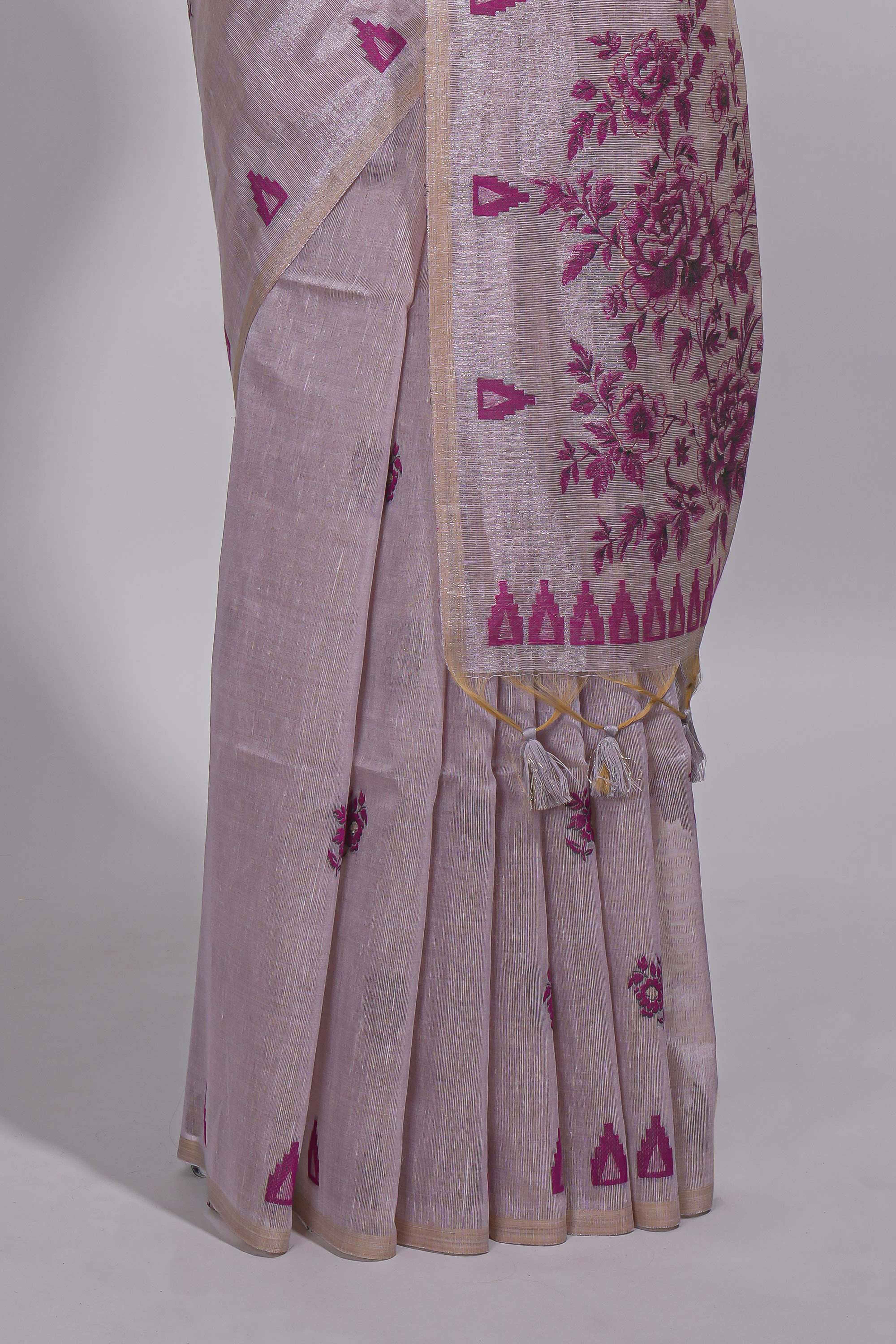 Magenta munga cotton all over floral thread motifs thread weaving border with floral jaal thread zari pallu and contrast small butta blouse