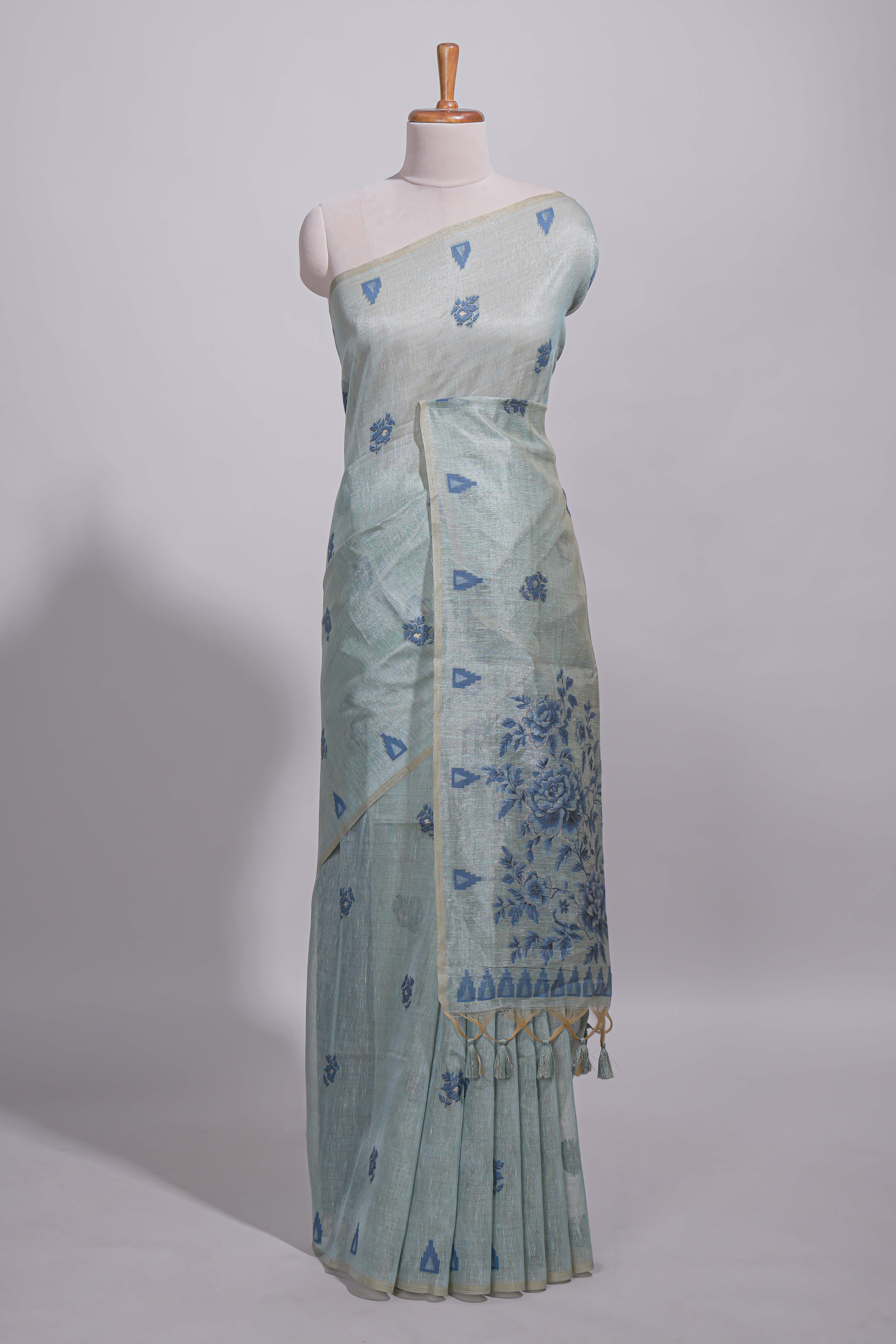 Blue munga cotton all over floral thread motifs thread weaving border with floral jaal thread zari pallu and contrast small butta blouse