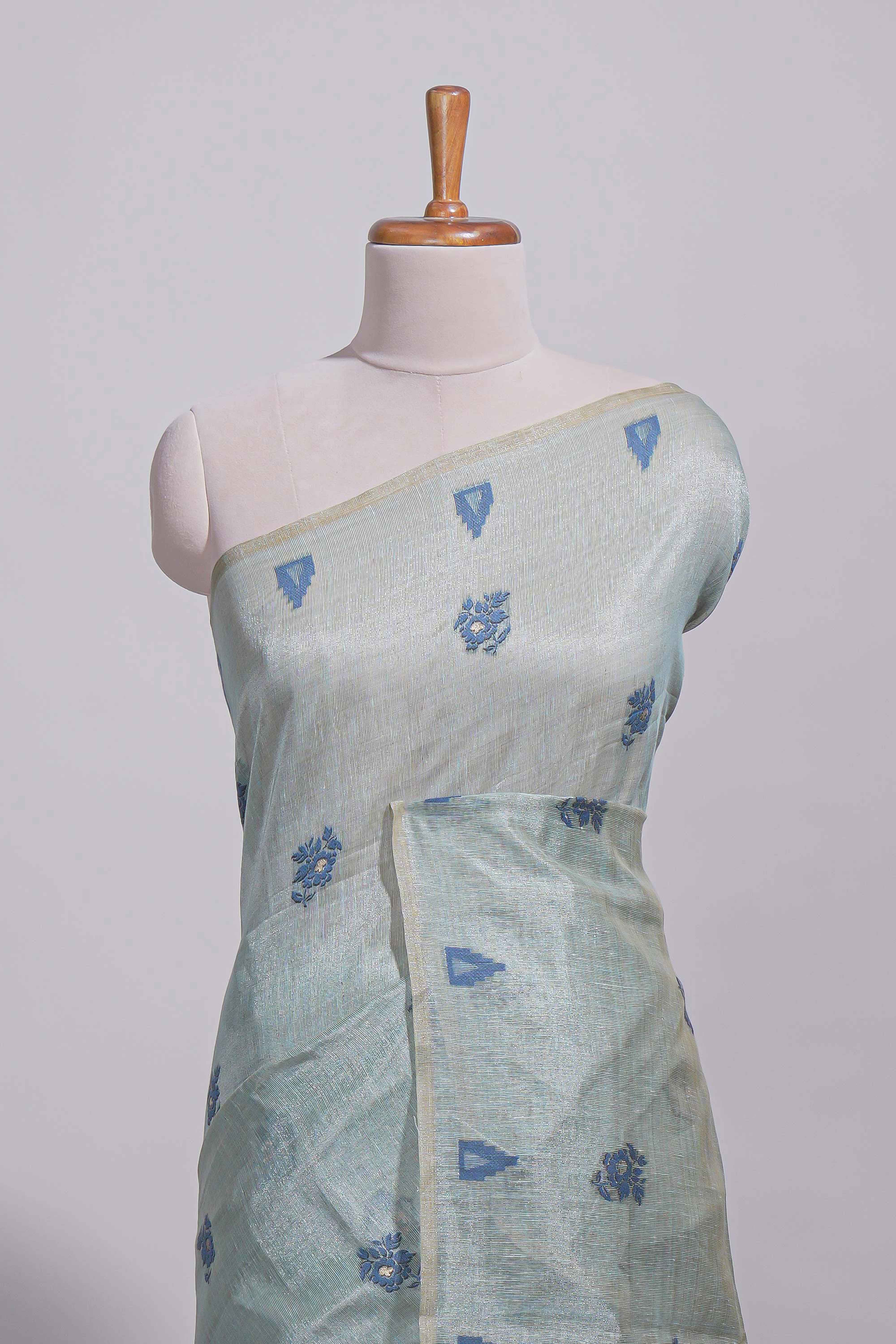 Blue munga cotton all over floral thread motifs thread weaving border with floral jaal thread zari pallu and contrast small butta blouse