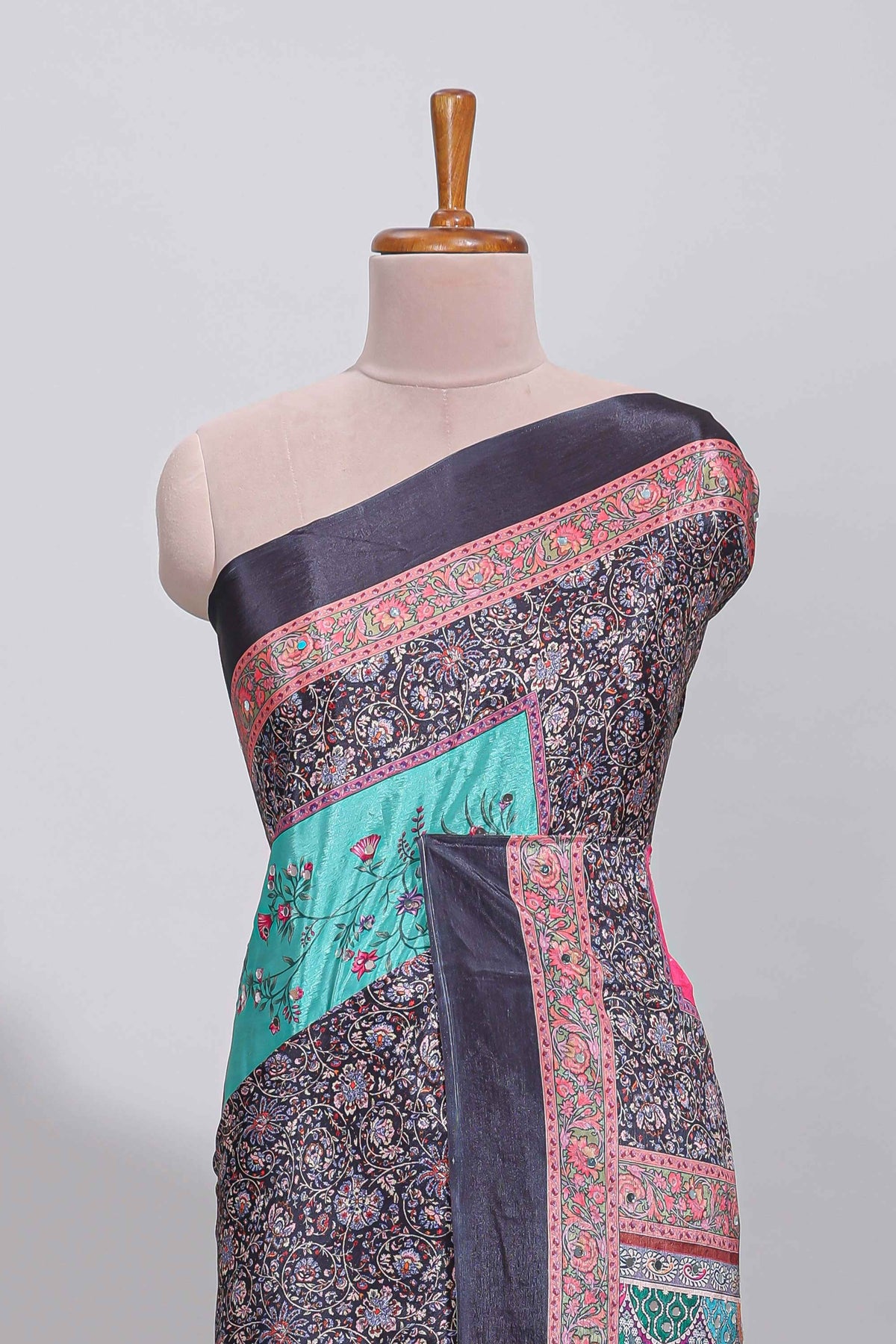 Black floral design mirror work masakali saree with self border and contrast motifs blouse