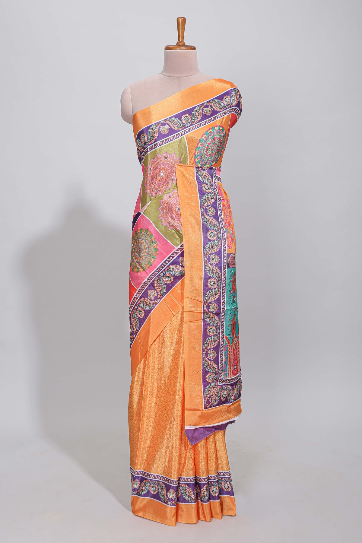 Orange floral design mirror work masakali saree with self border and contrast motifs blouse