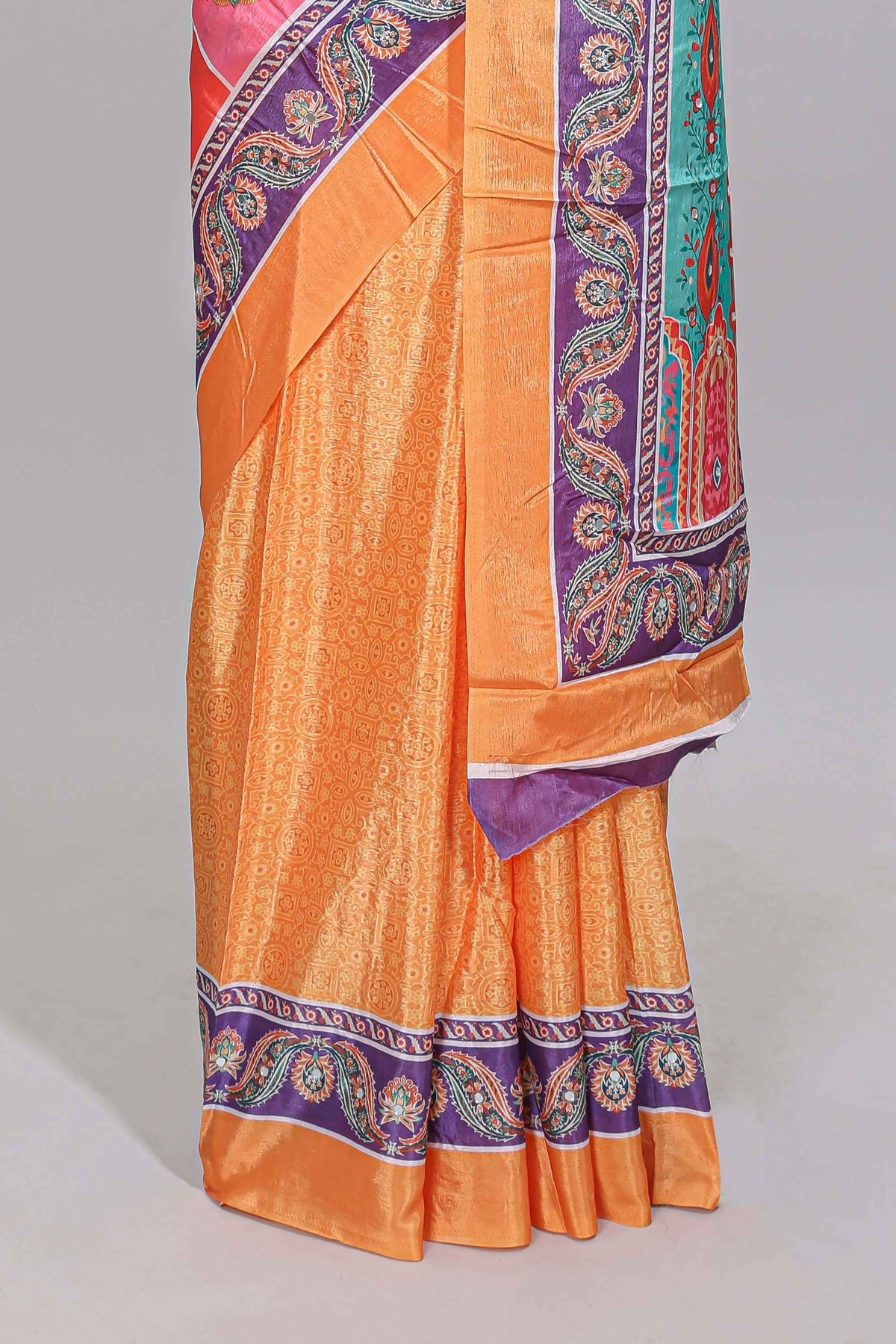 Orange floral design mirror work masakali saree with self border and contrast motifs blouse