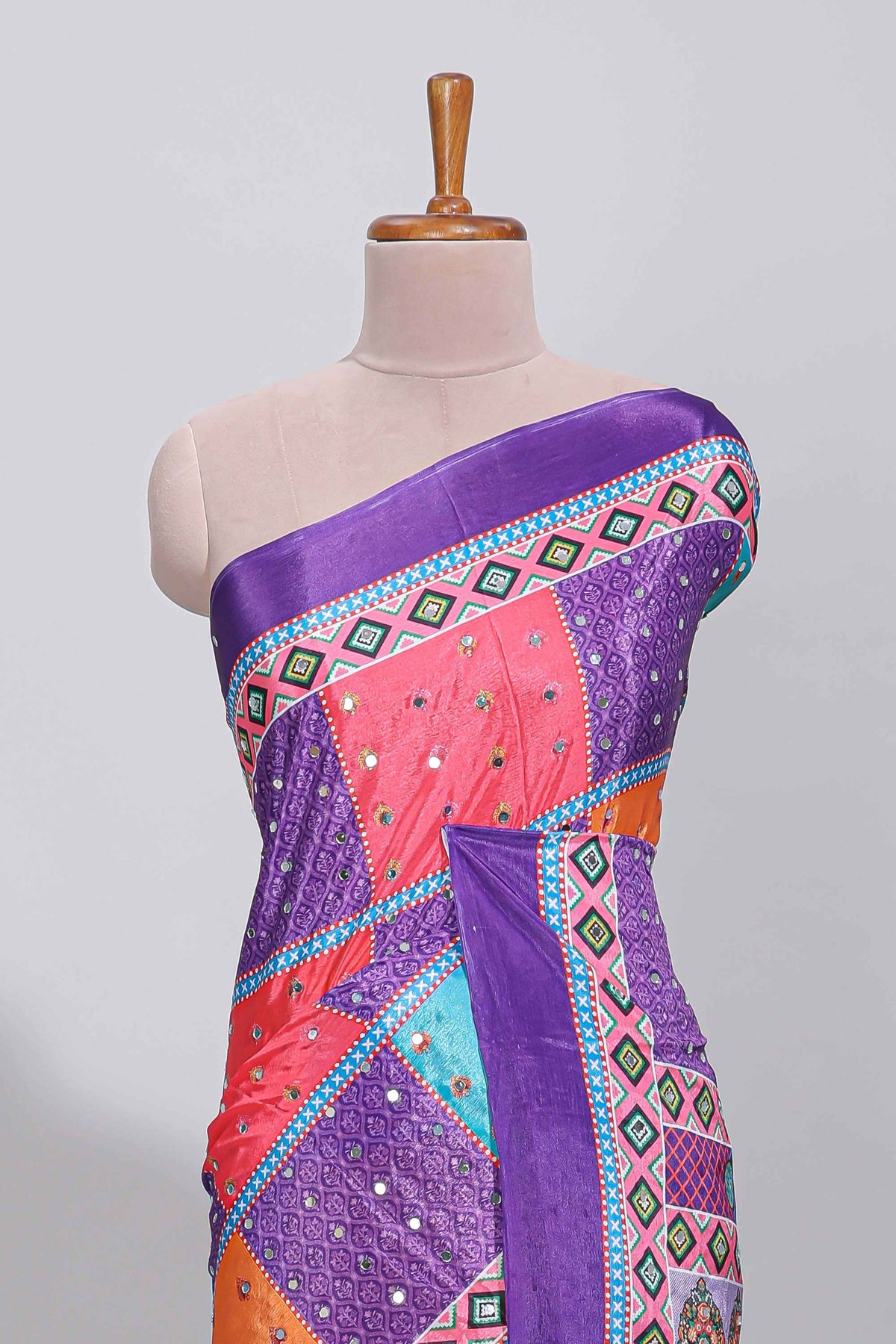 Violet floral design mirror work masakali saree with self border and contrast motifs blouse
