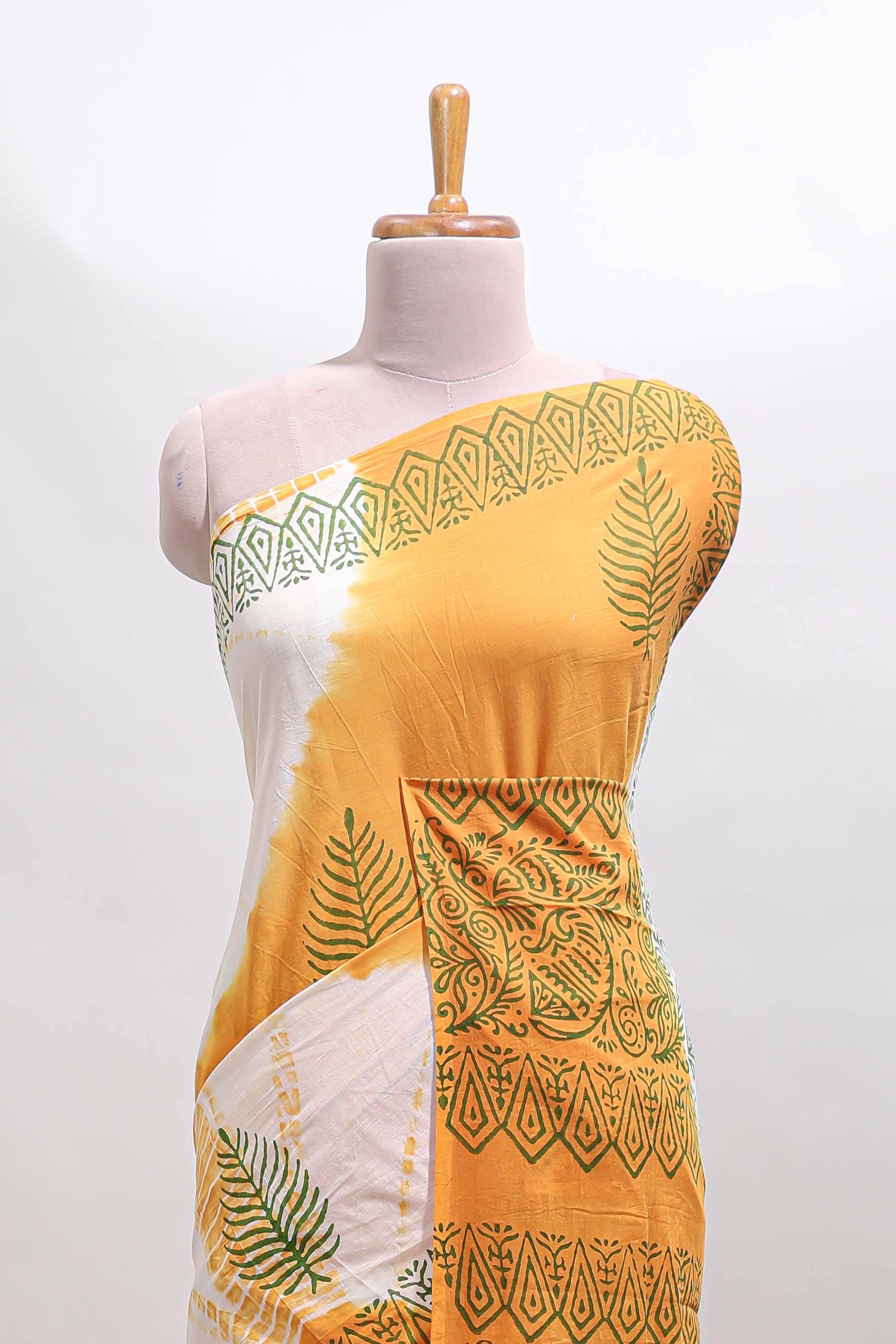 Cream & mustard leaf motifs mul mul cotton saree with self border and matching blouse