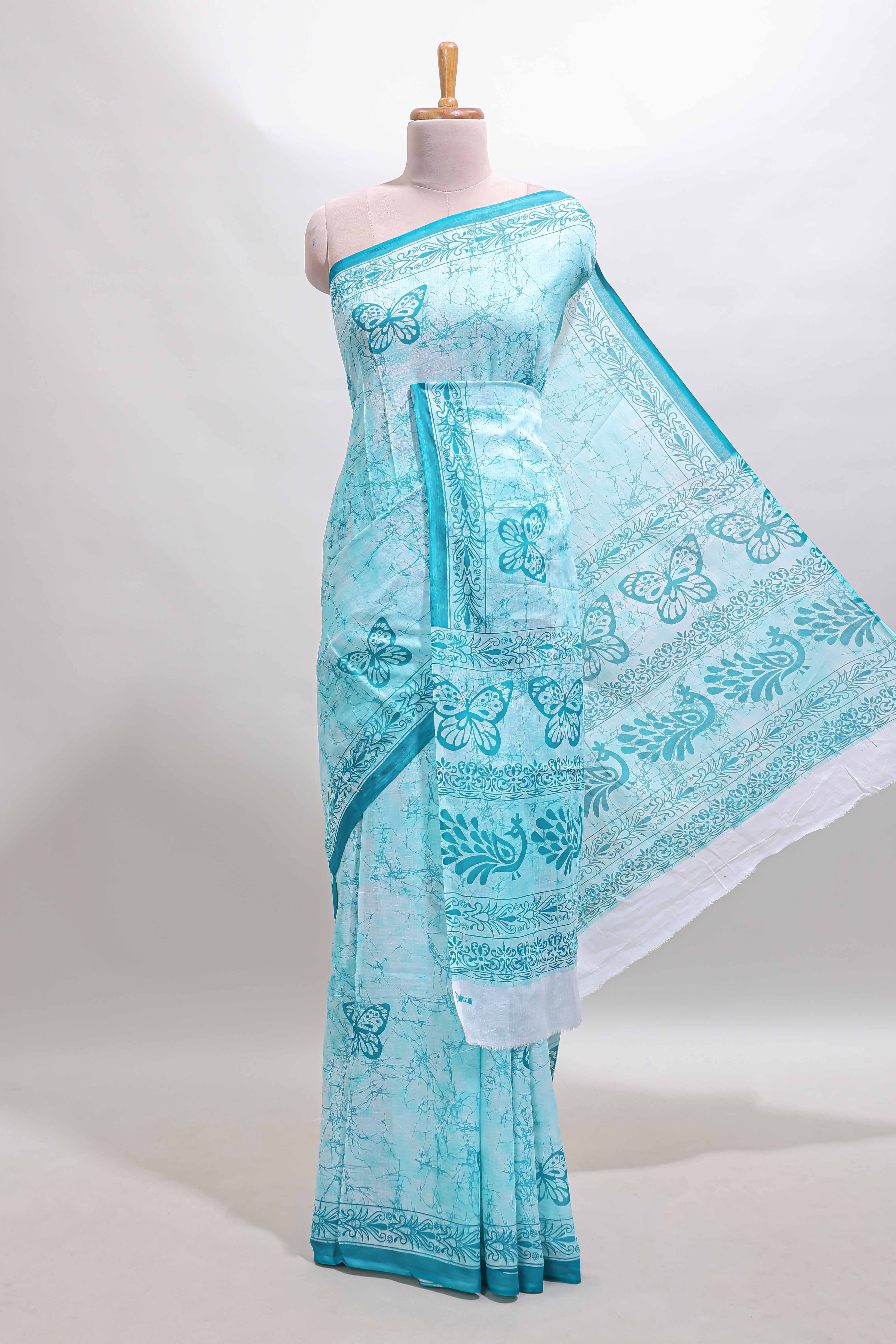 Turquoise green butterfly motifs design mul mul cotton saree with self border and matching warli print blouse