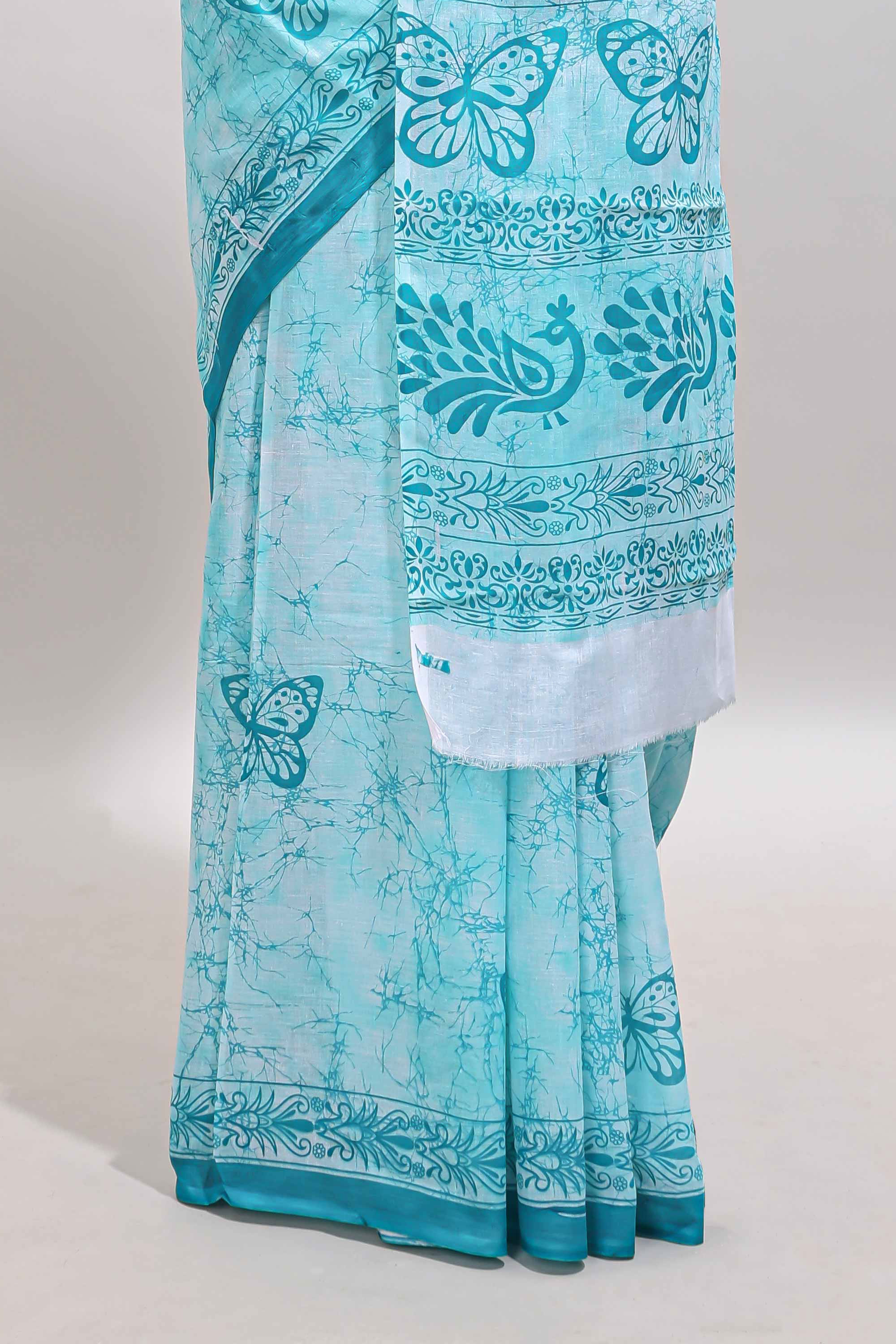 Turquoise green butterfly motifs design mul mul cotton saree with self border and matching warli print blouse