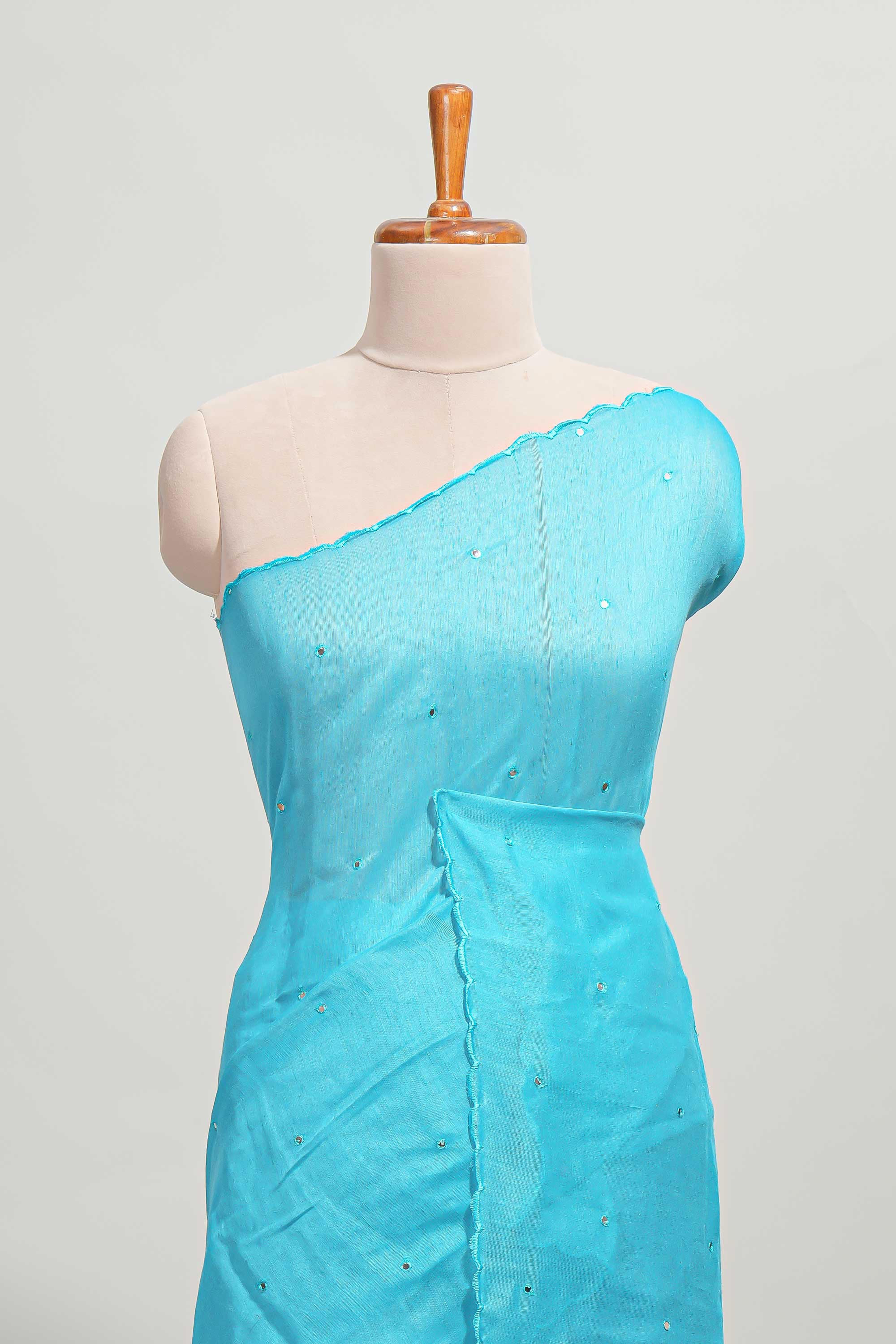 Blue mirror work embroidery design mul mul cotton saree with self scallop border and contrast multi color blouse